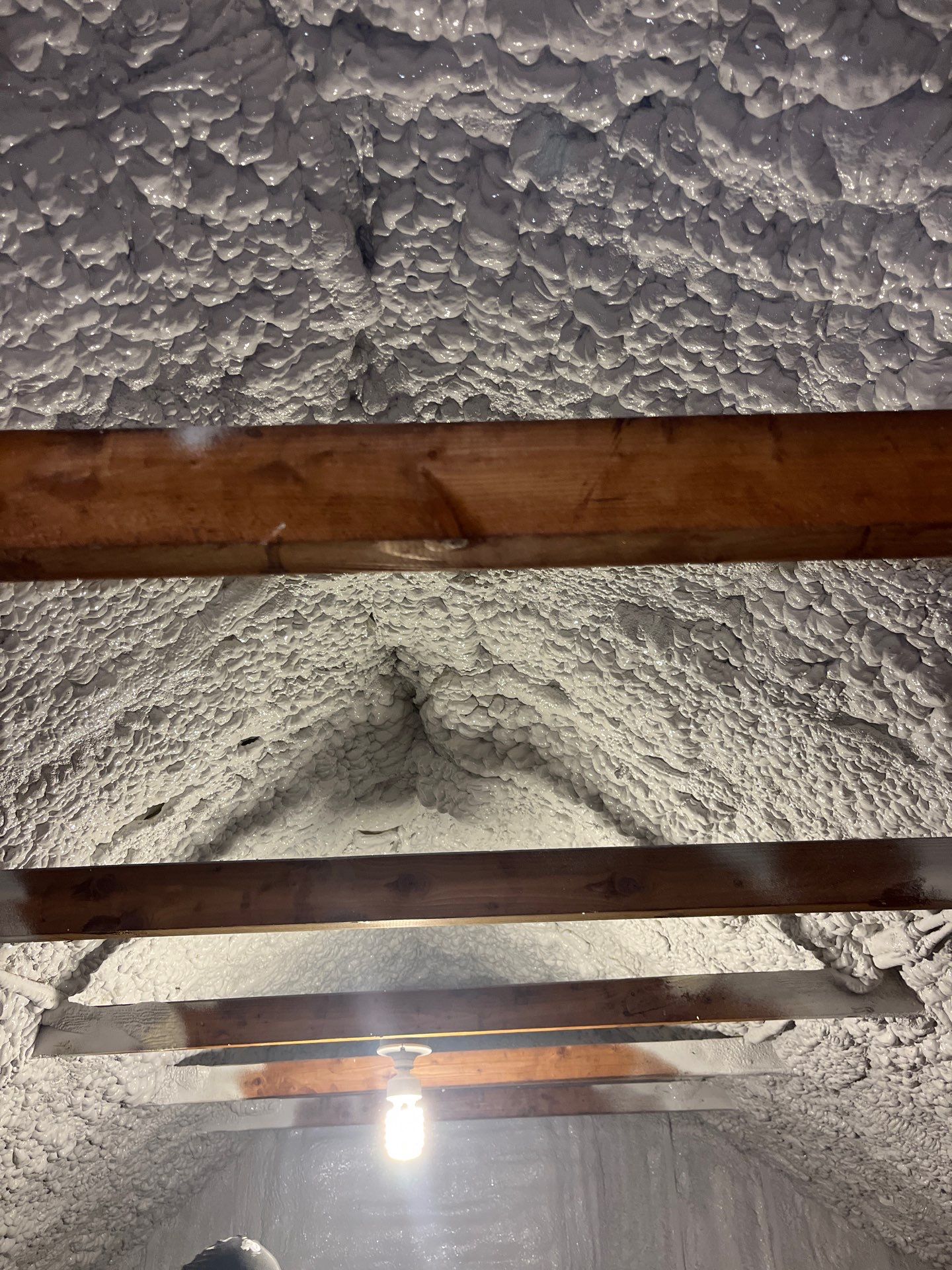 Attic Retrofit using open cell spray foam by NYS Foam & Energy