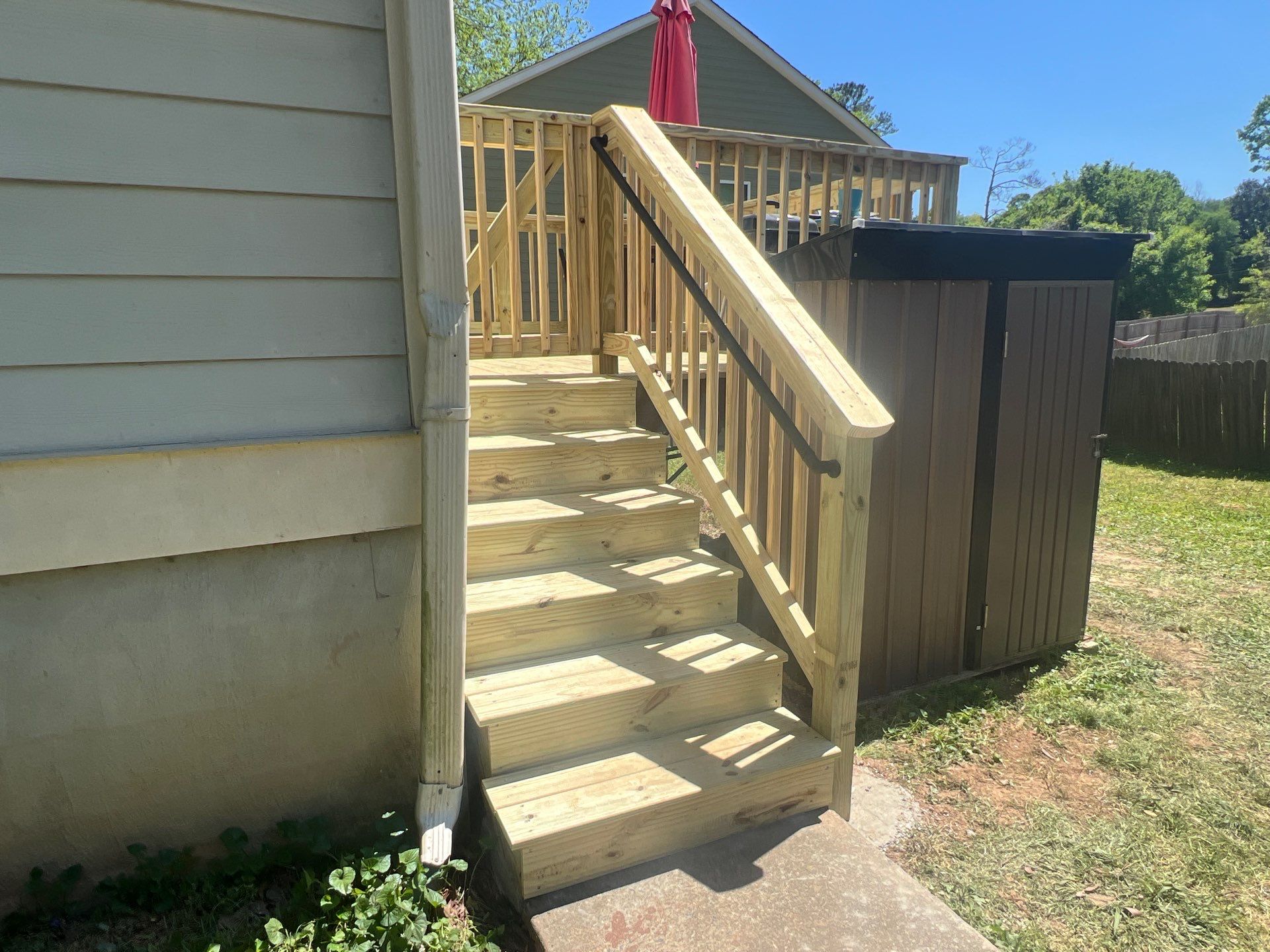 Pressure-Treated Wood Deck and Staircase Replacement in Atlanta by Swift Home Renovations