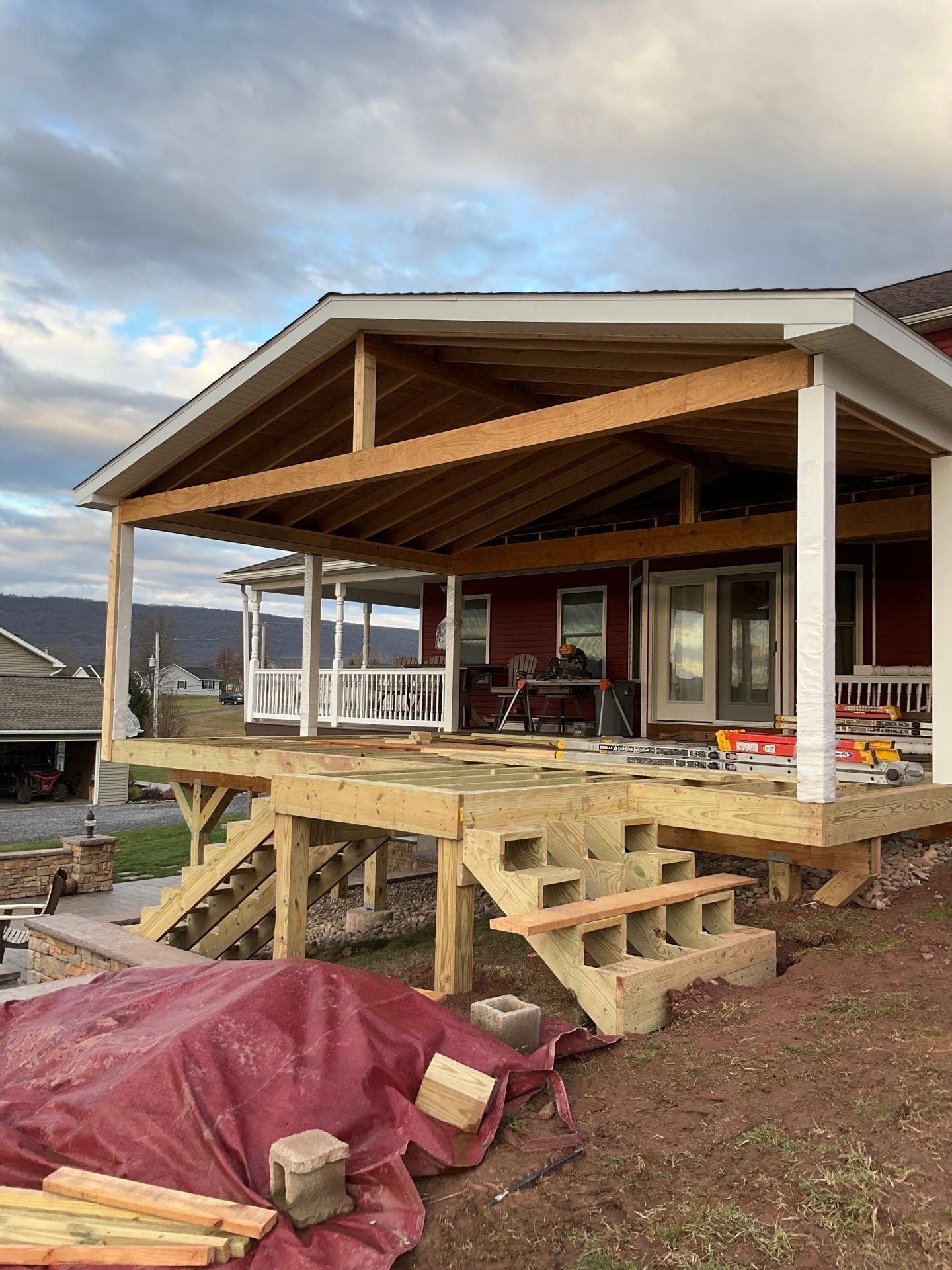 Covered Deck Addition With Custom Gable Roof in Tower City by Esh Builders
