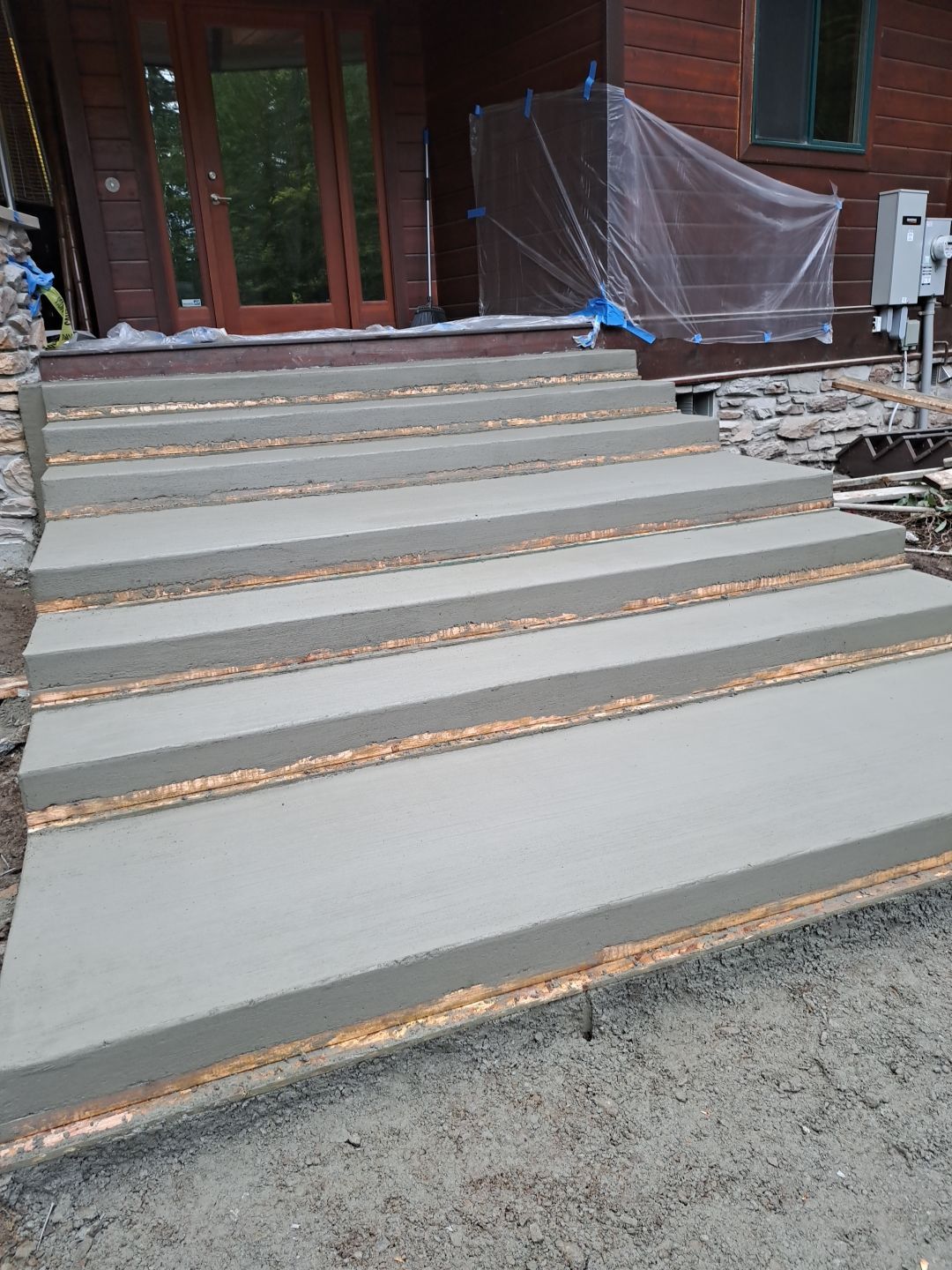 Pia | Custom Concrete Driveway, Walkway & Floating Steps by Jireh Asphalt & Concrete Inc 