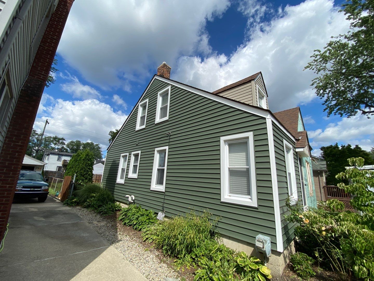 Siding Replacement using CertainTeed Restoration Classic D5 Forest Green by 180 Contractors