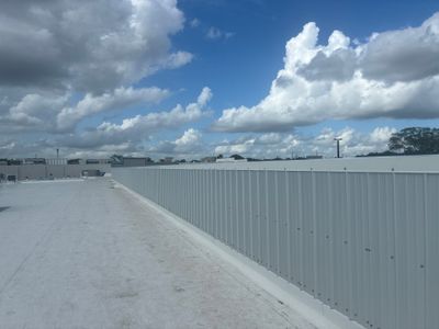 Orlando Commercial Roof Installation and Metal Parapet Wall Siding