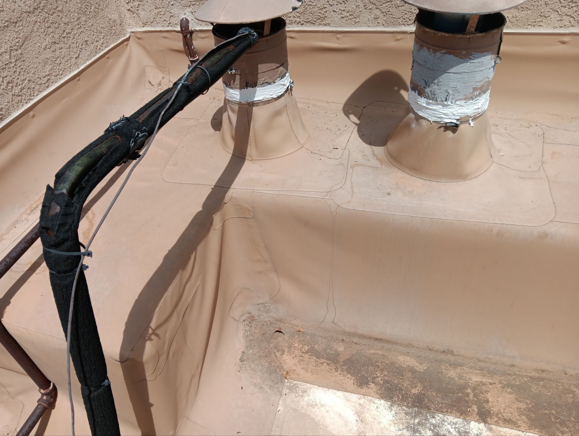 Tile and TPO Roof Maintenance and Gutter Cleaning in Sandia Heights by Doyle Roof Masters Inc