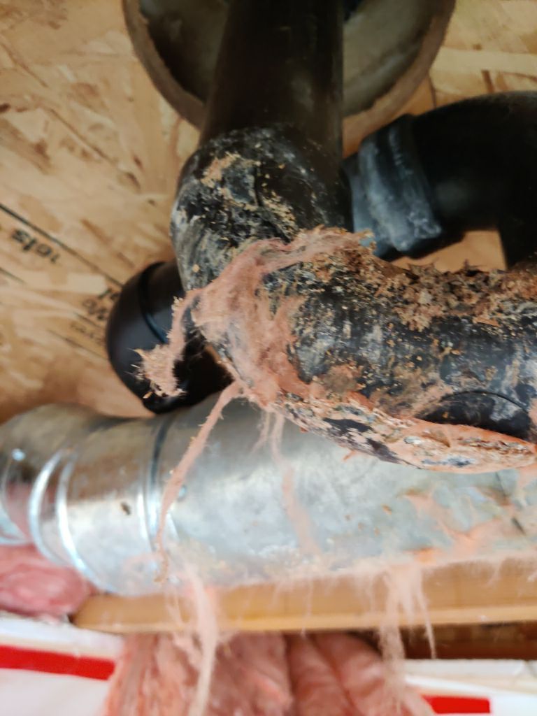 Water Damage in Garage by Accountable Home Services