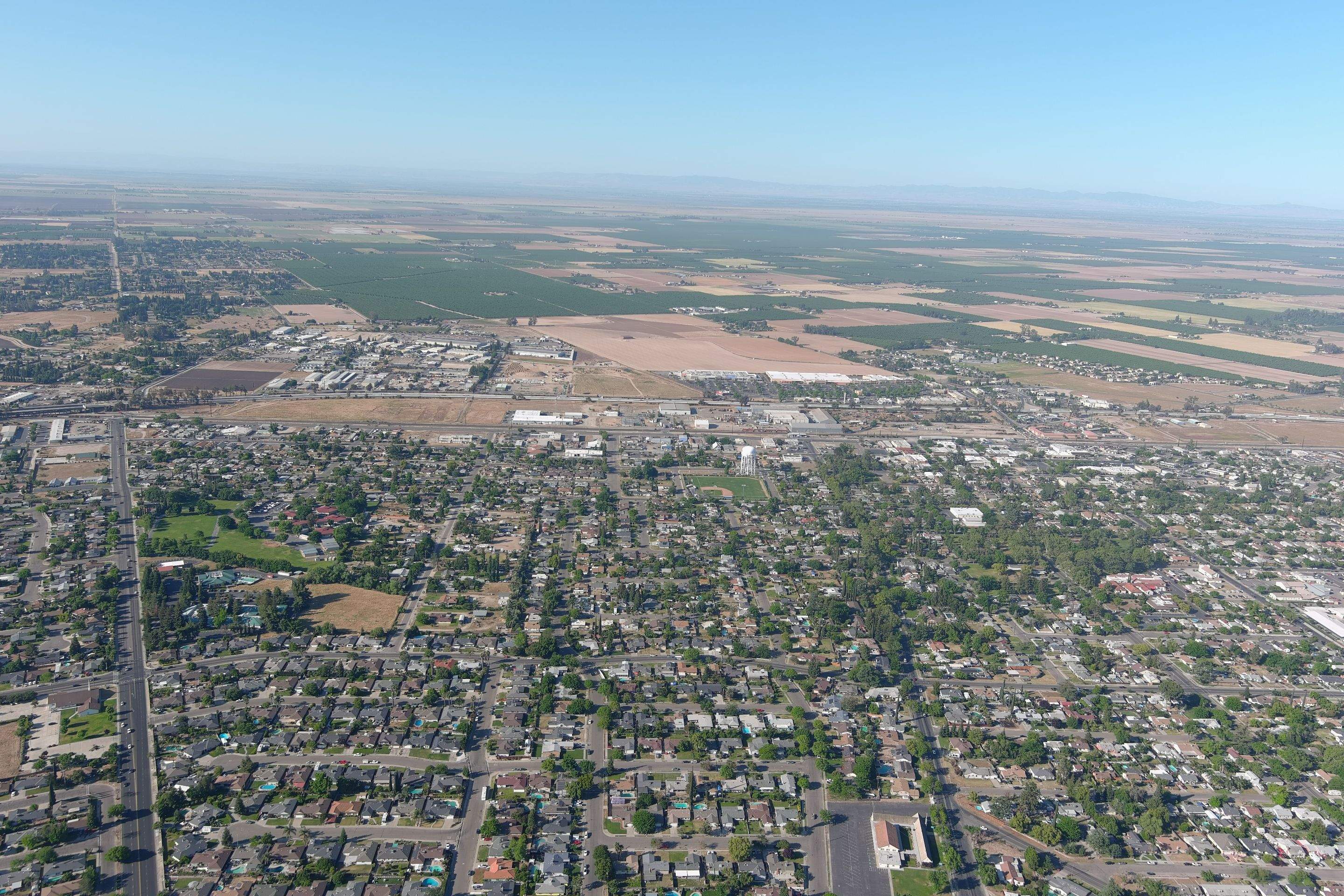 Metal roof restoration on commercial roof using Conklin Benchmark/ PUMA XL acrylic coatings over metal and foam by Straight Edge Roofing Inc