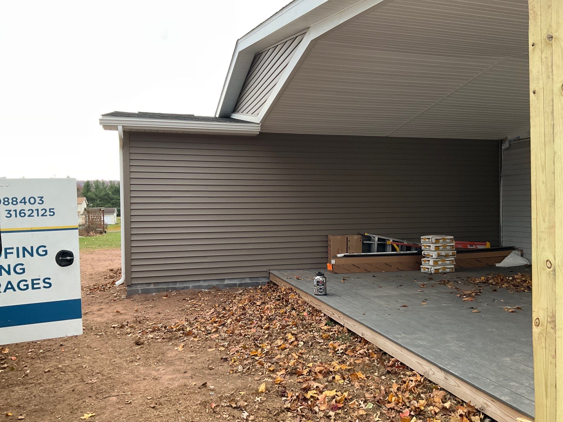 Residential Addition and Covered Porch Roof  by Esh Builders