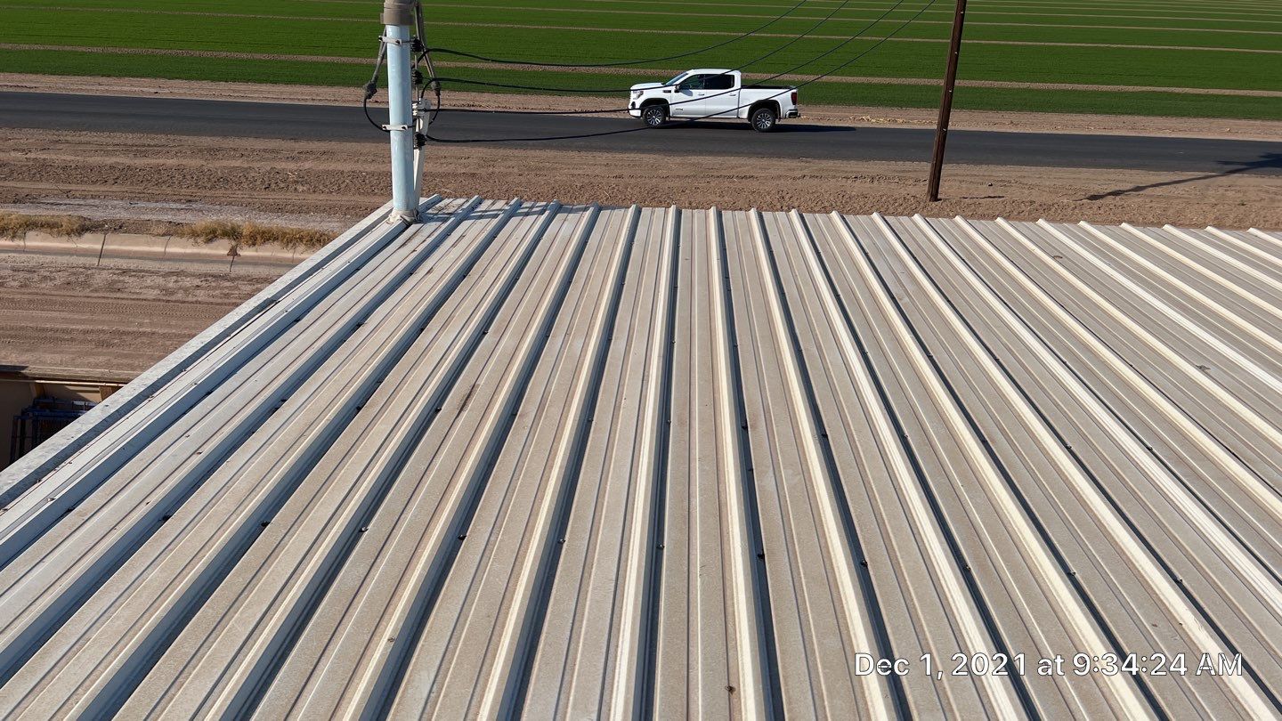 Metal roof restoration on commercial roof using Conklin Benchmark/PUMA XL fabric and coating by Straight Edge Roofing Inc