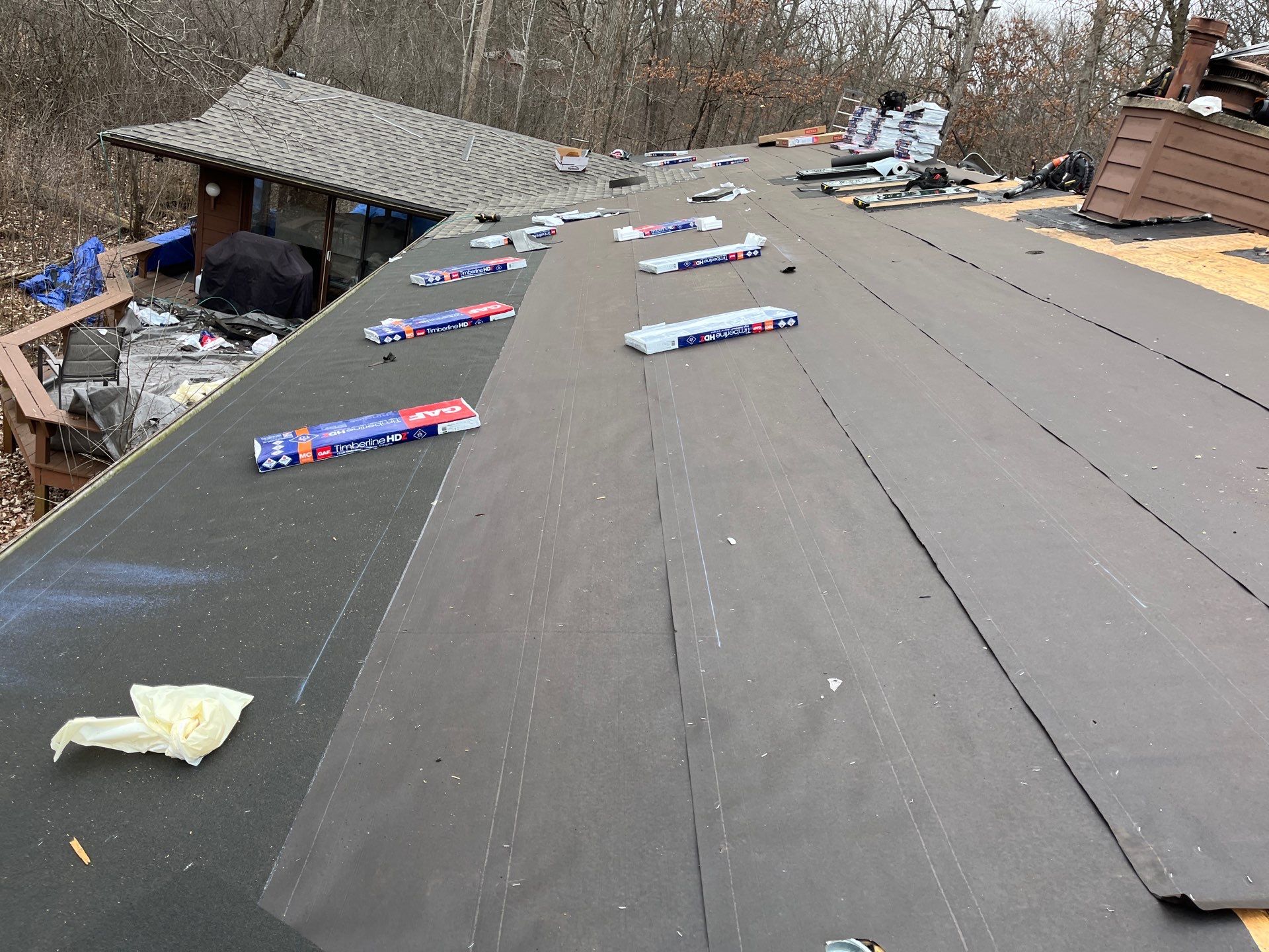 Asphalt Roof Replacement by Custom Installations