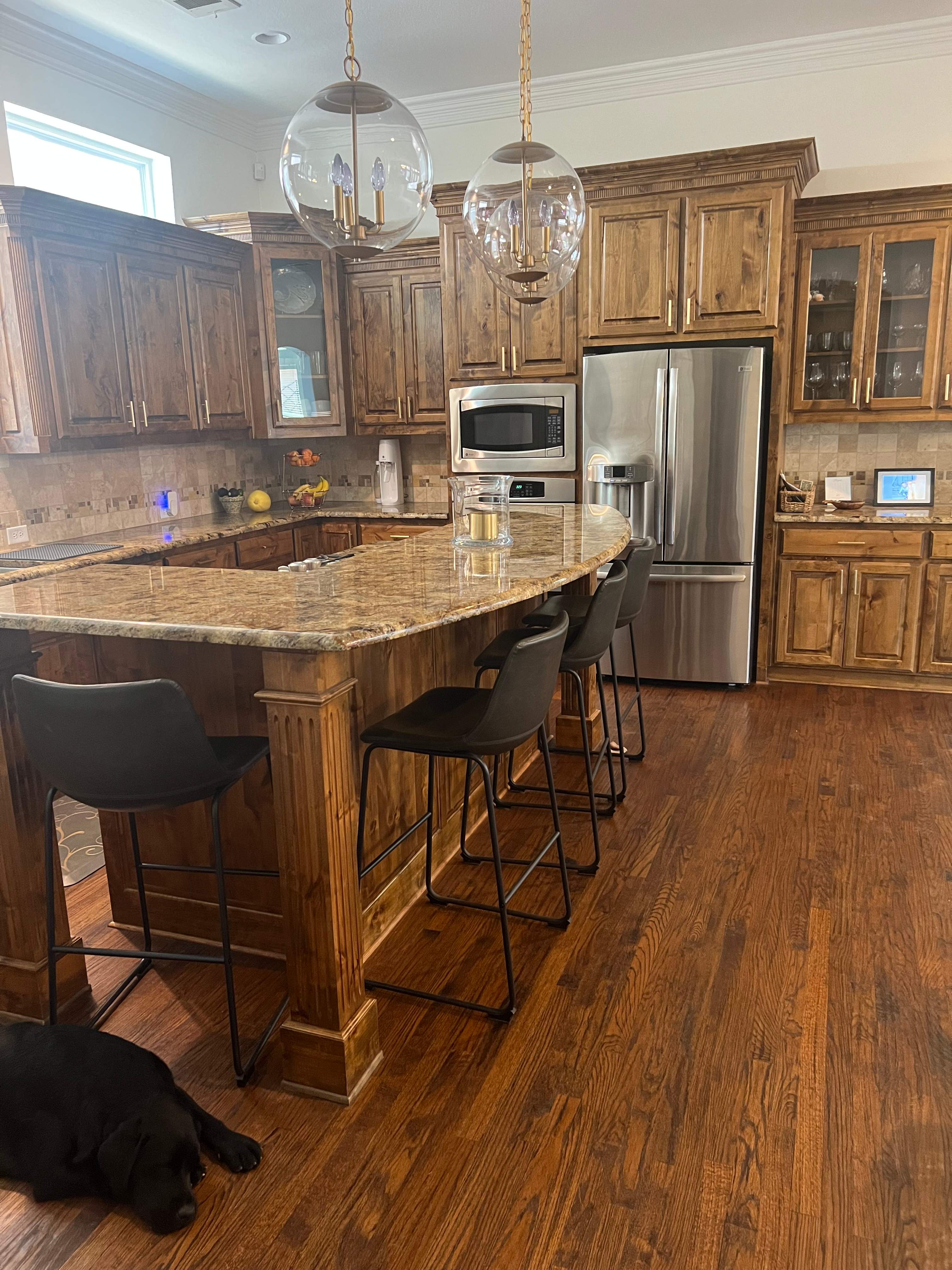 Kitchen Remodel using Quartzite by SLM General Contractors & Roofing