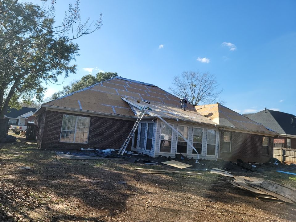 Residential Roofing Installation using Roof Replacement by American Roofing & Construction LLC