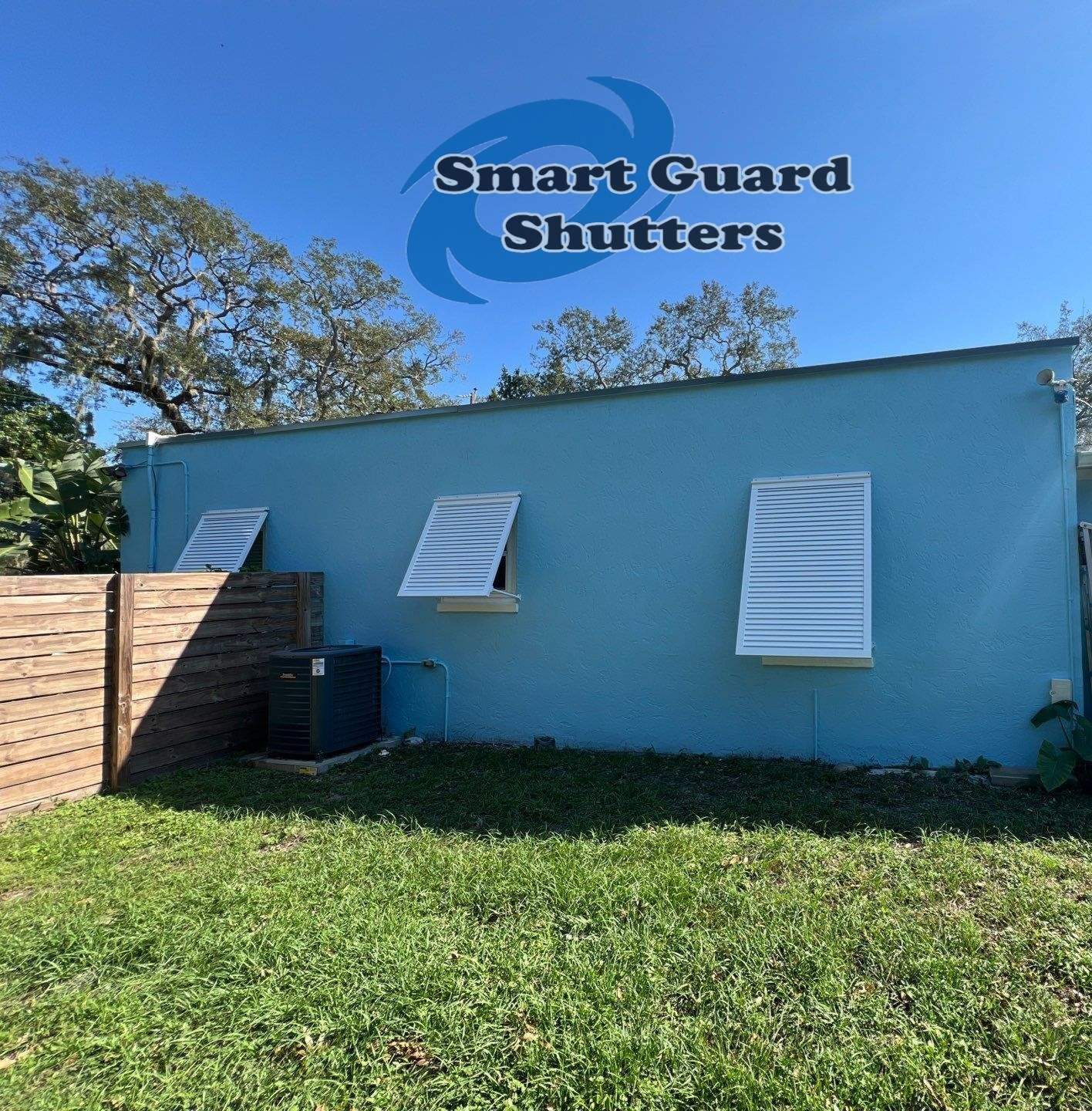 Decorative Bahama Shutters in Signal White  by Smart Guard Shutters