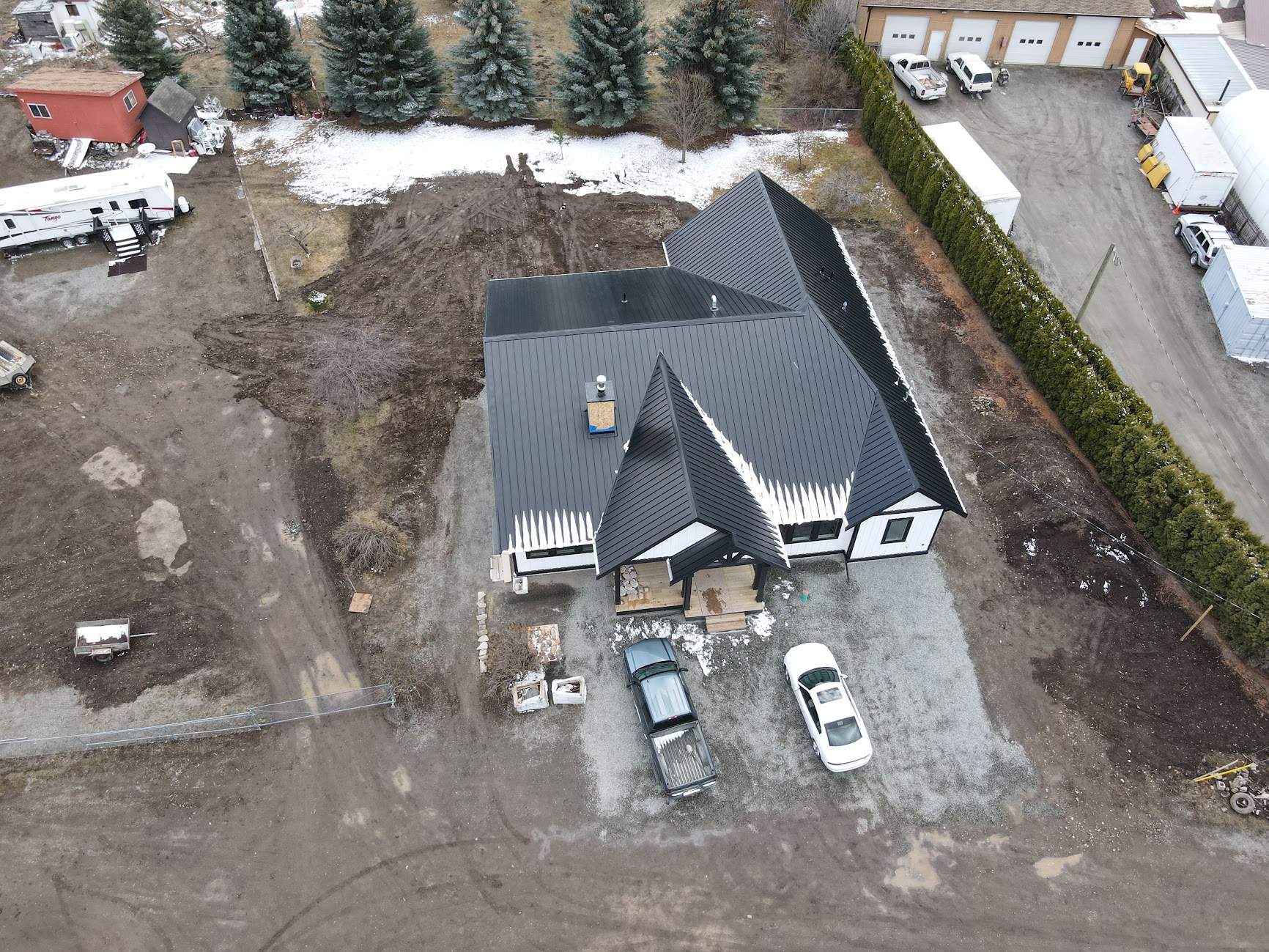 Residential Roofing Installation using 12" Prolok metal  by Top Notch Roofing Inc