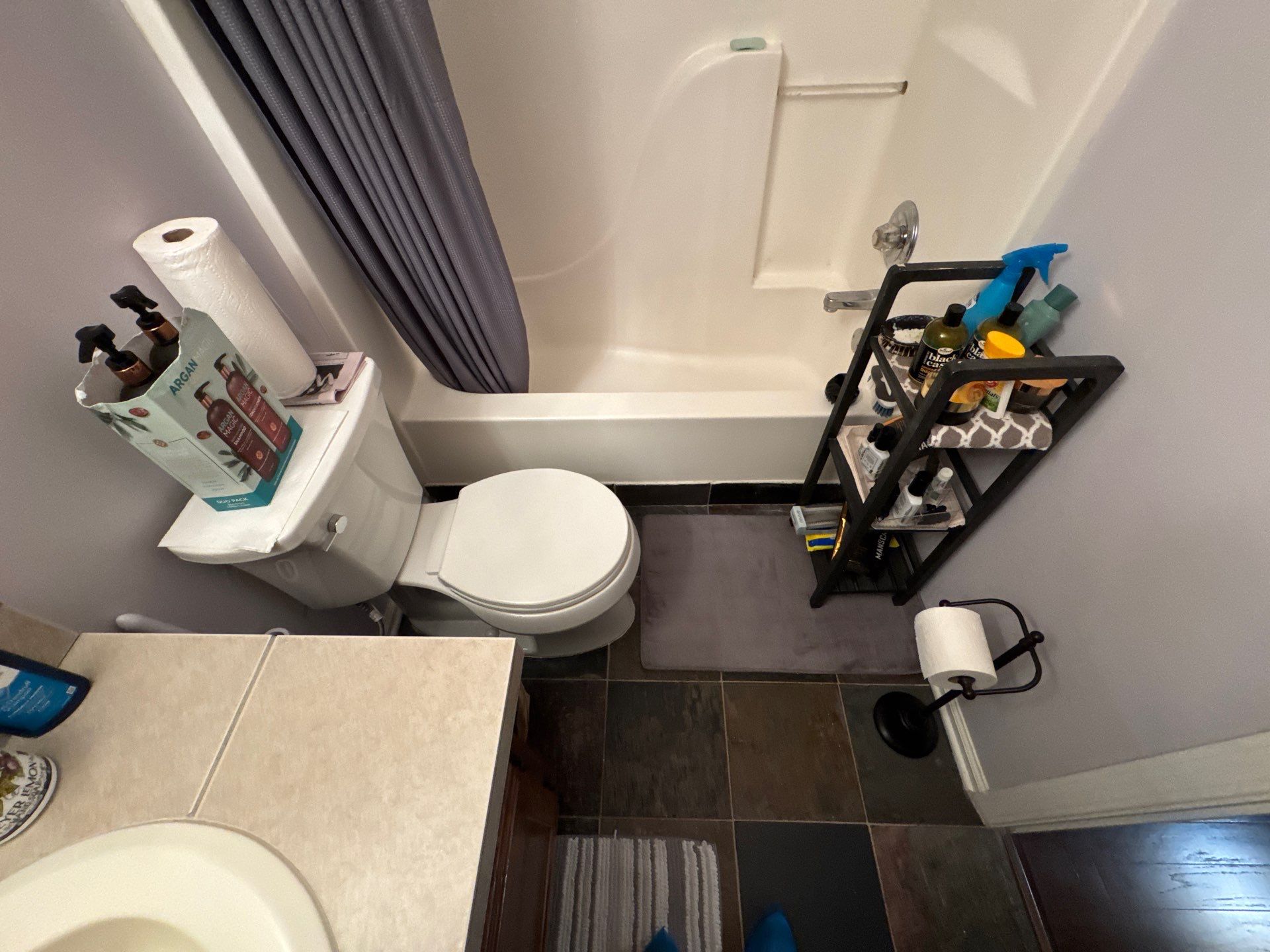 Guest bathroom tub and flooring by Prudencio
