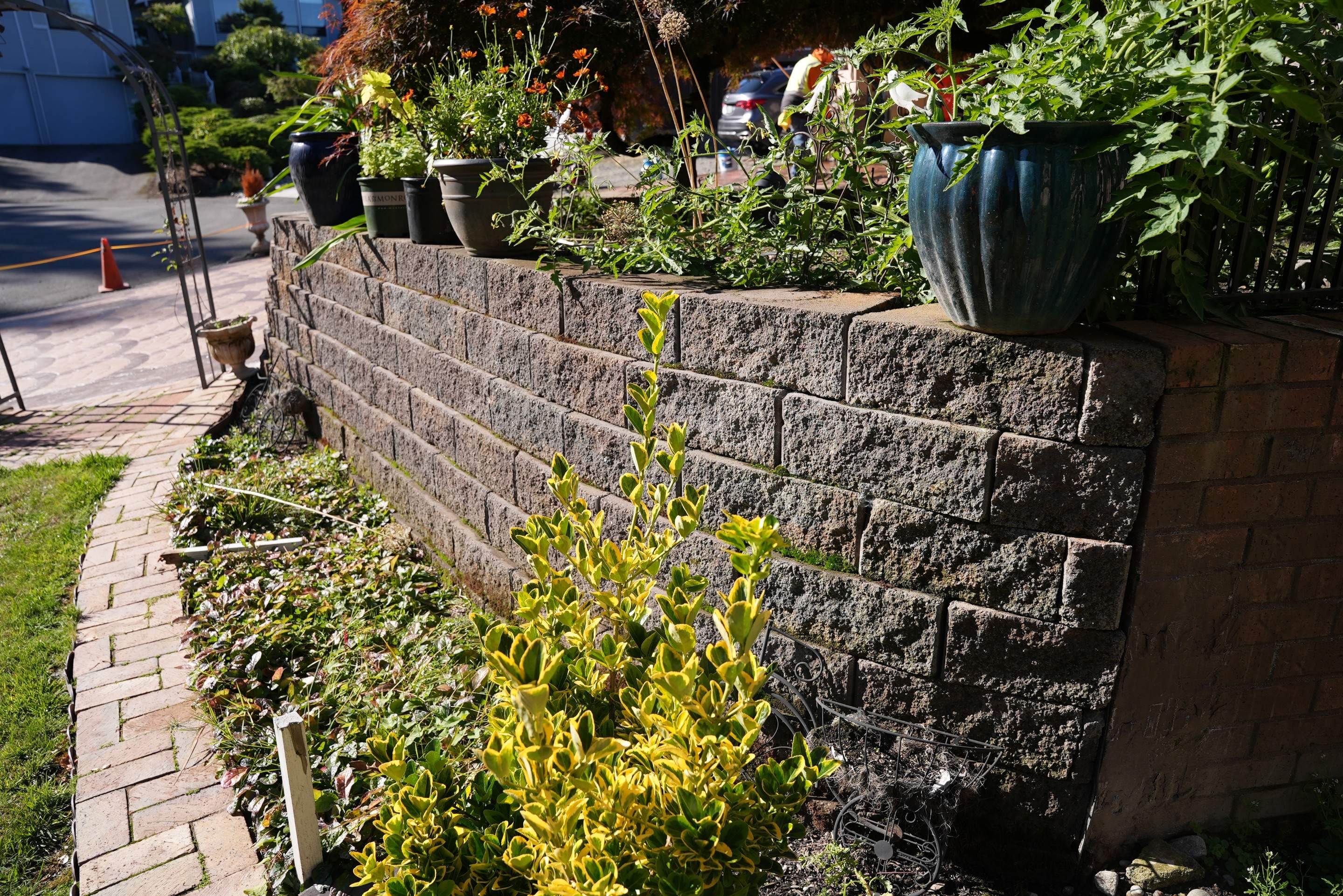 Mehta | Tiled Driveway with Sealer & Retaining Wall  by Jireh Asphalt & Concrete Inc 