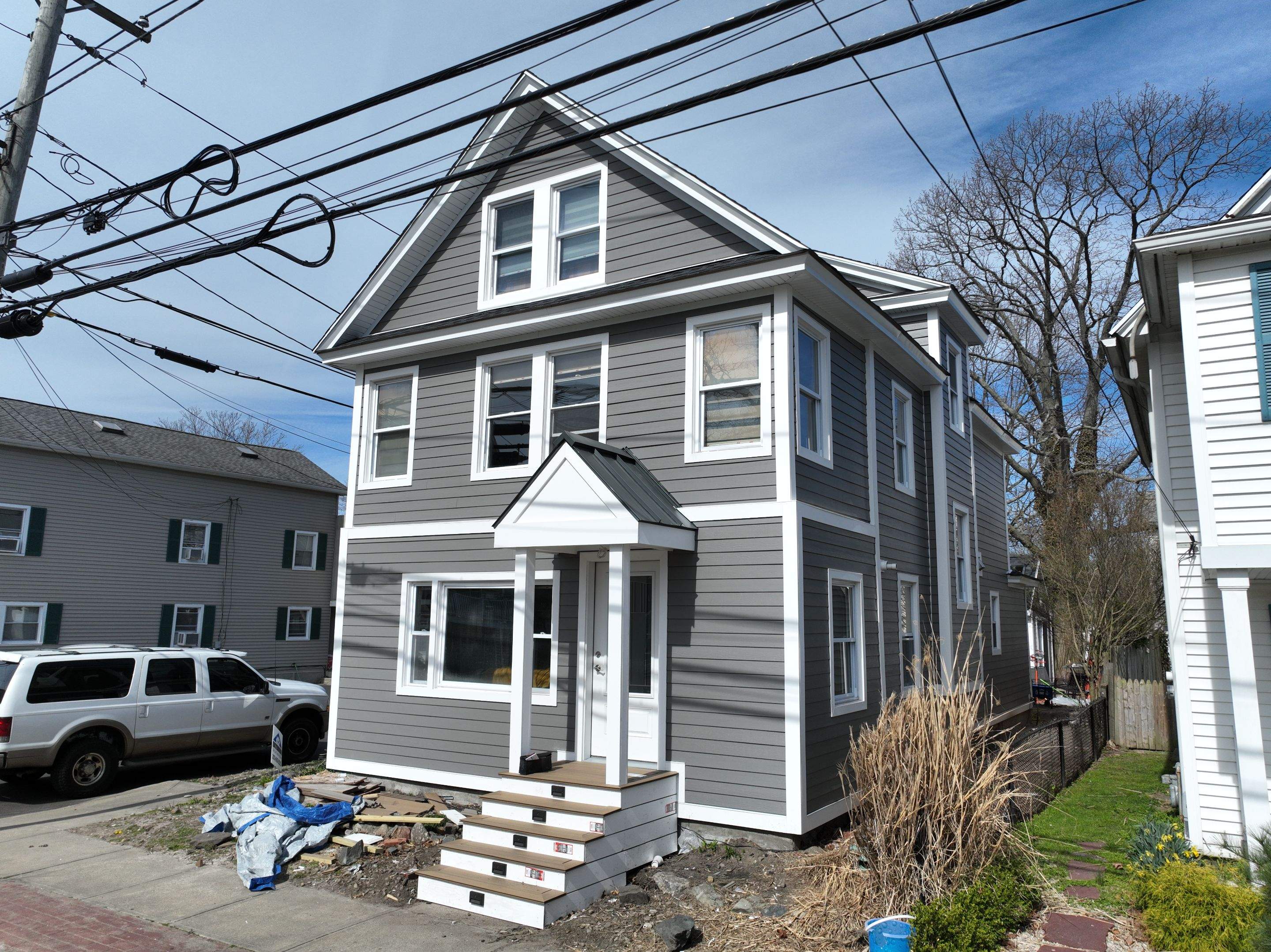 Siding Installation using Hardie Plank Aged Pewter by A Plus Exterior