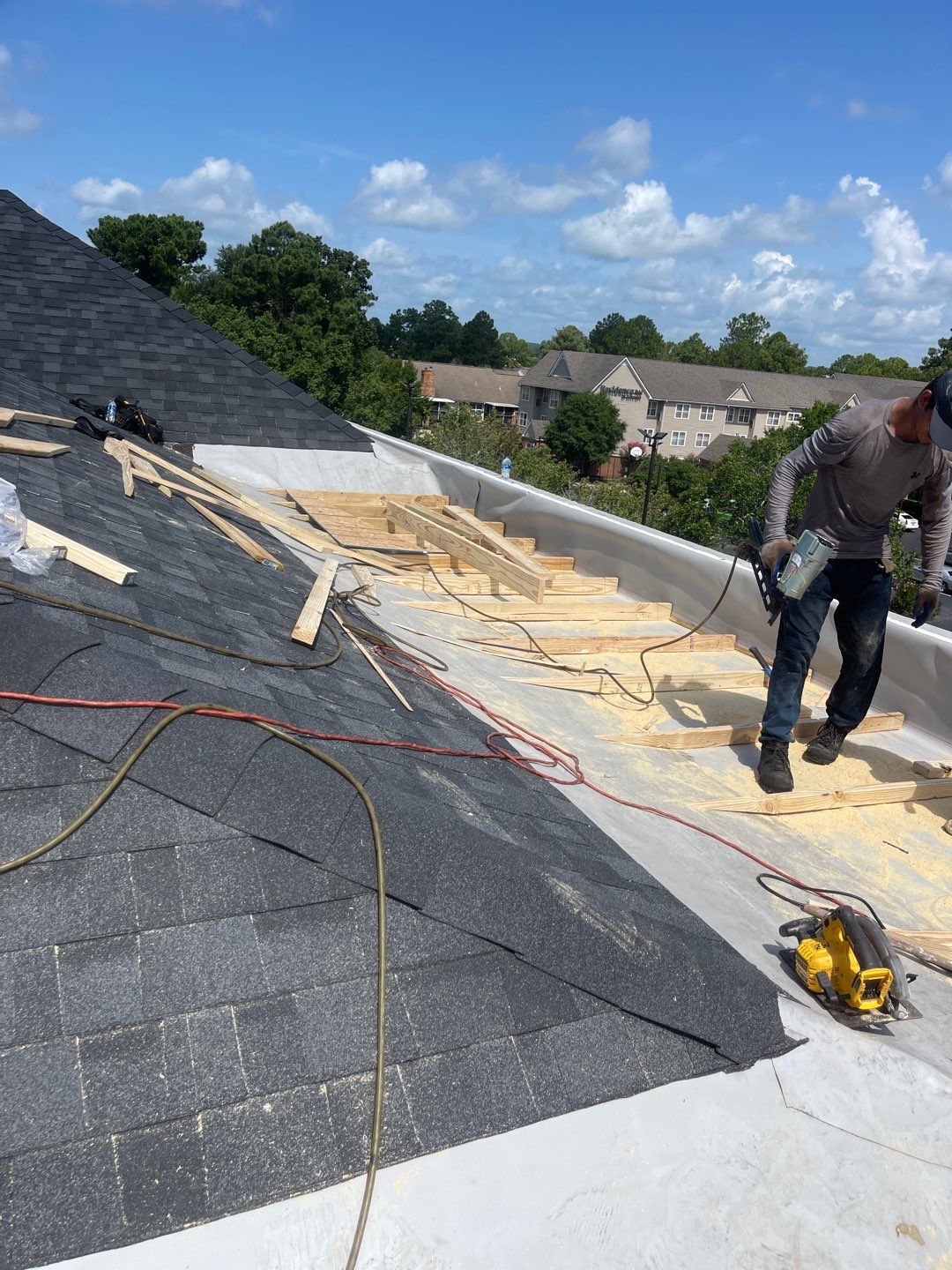 Commercial Roofing Installation using Roof Replacement by American Roofing & Construction LLC