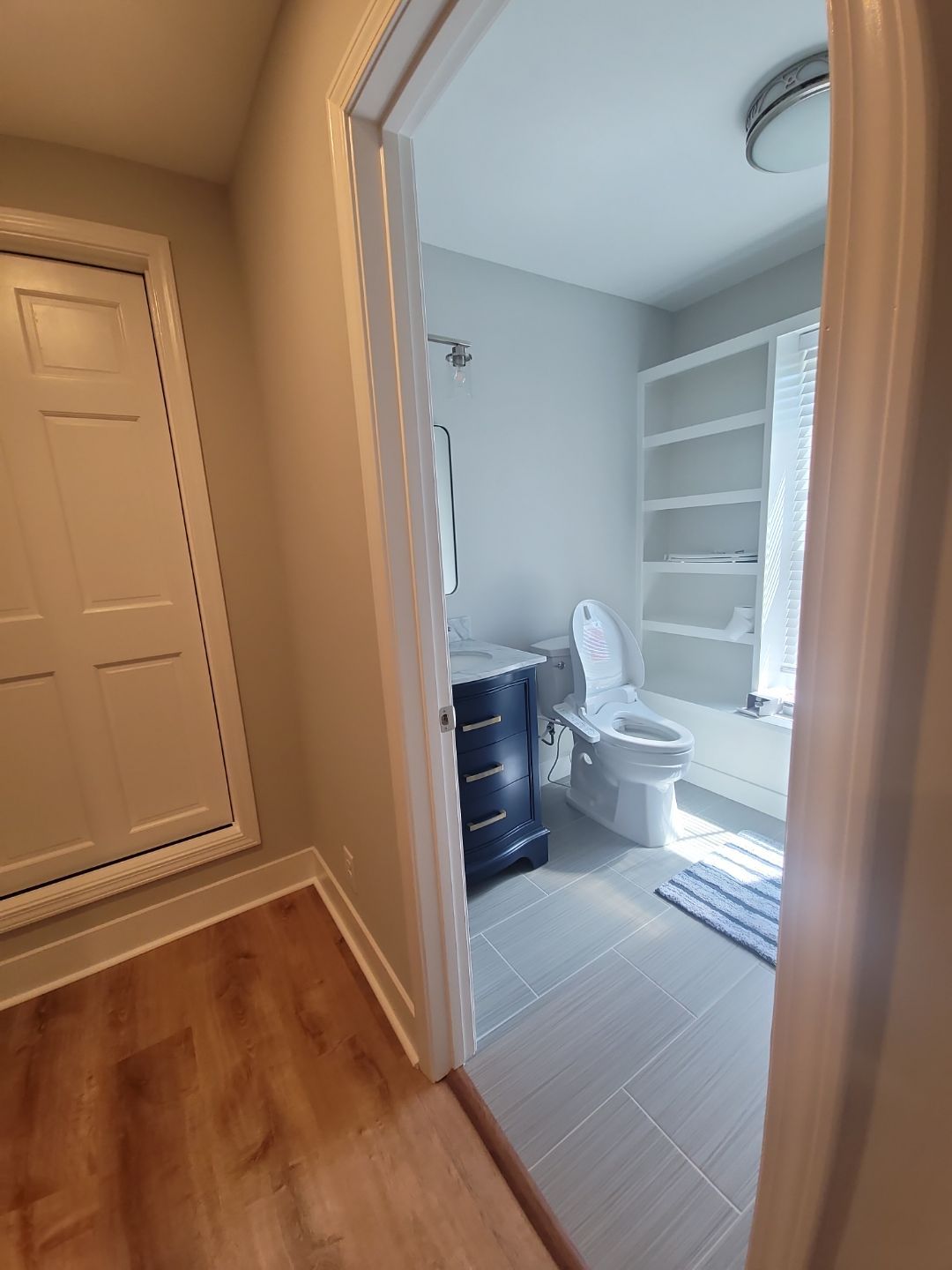 From Rafters to Retreat: An Attic Transformed with a Luxe Bath Escape by Elite Remodeling and Design LLC