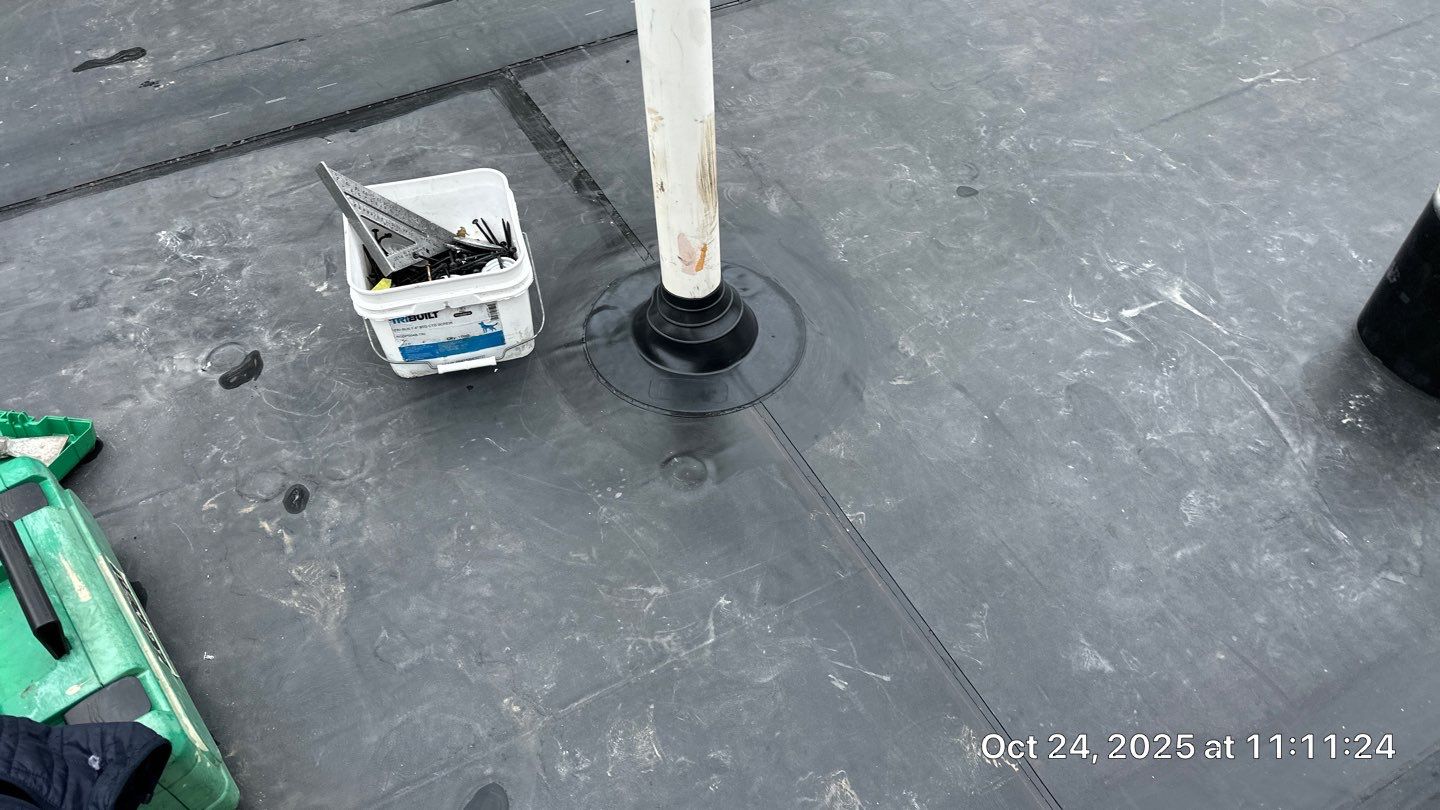Westford EPDM Flat Roof with Gutter & Soffit/Fascia Replacement by Mighty Dog Roofing of Greater Middlesex County