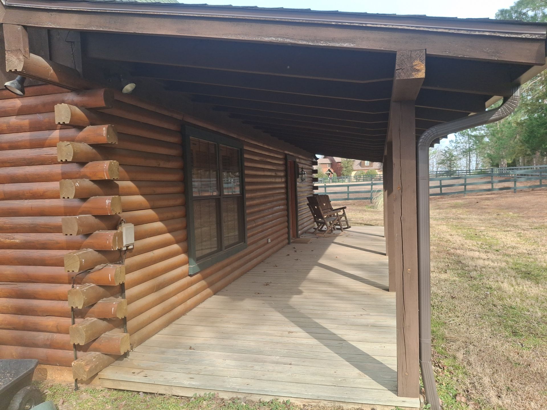 A Complete Exterior Refresh for a Custom Log Home & Property in Alba, Texas by Quality Coats Painting