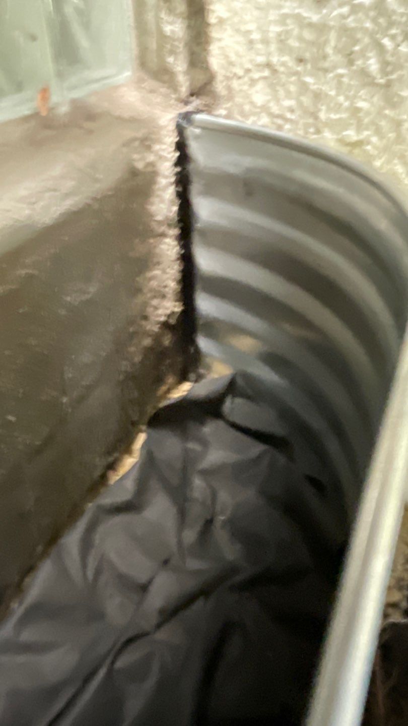 Window Wells & Foundation Grading in South Minneapolis by Waterproofing Northeast