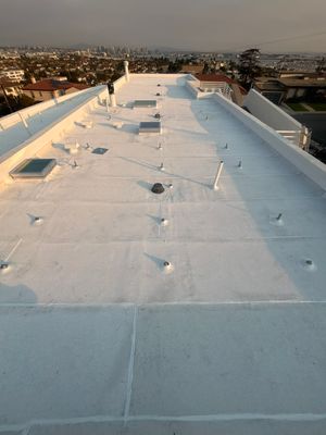 Point Loma Flat Roof Replacement – Johns Manville Bright White Torch-Applied Roofing System by Zenith Roofing Services 