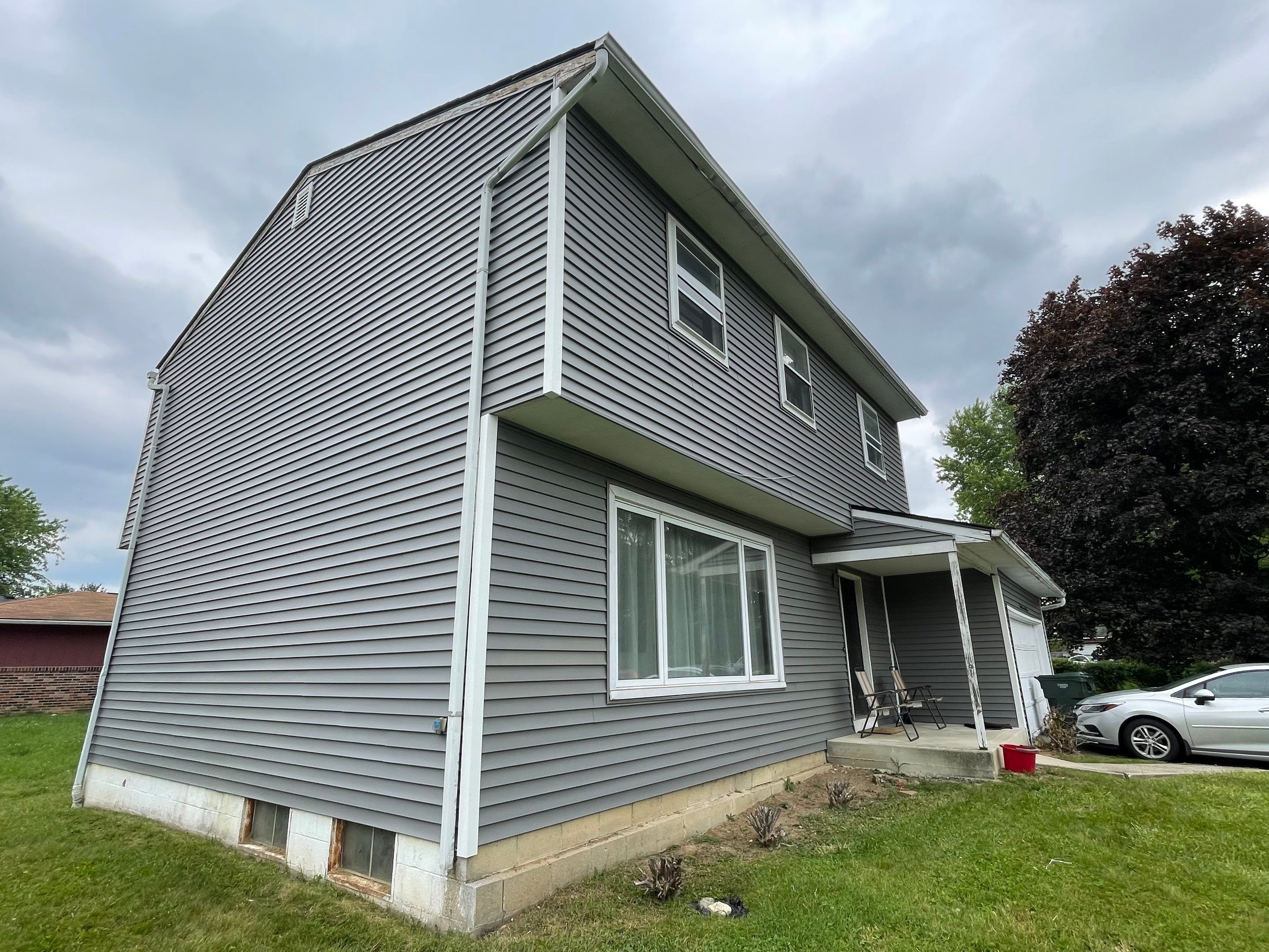 Siding Installation using Exterior Portfolio Vinyl Siding by SOS Home Ohio 