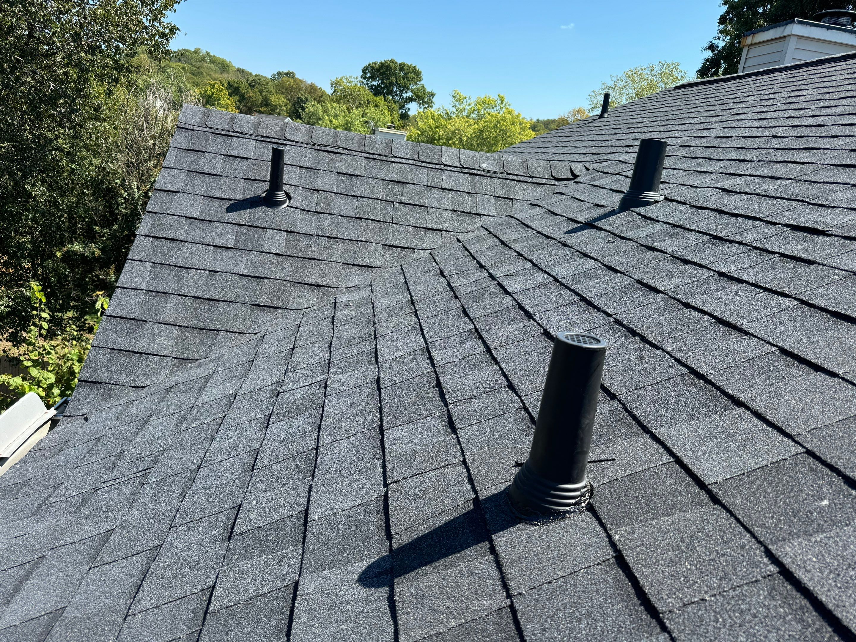 Moire Black Re-Roof by Royal House LLC