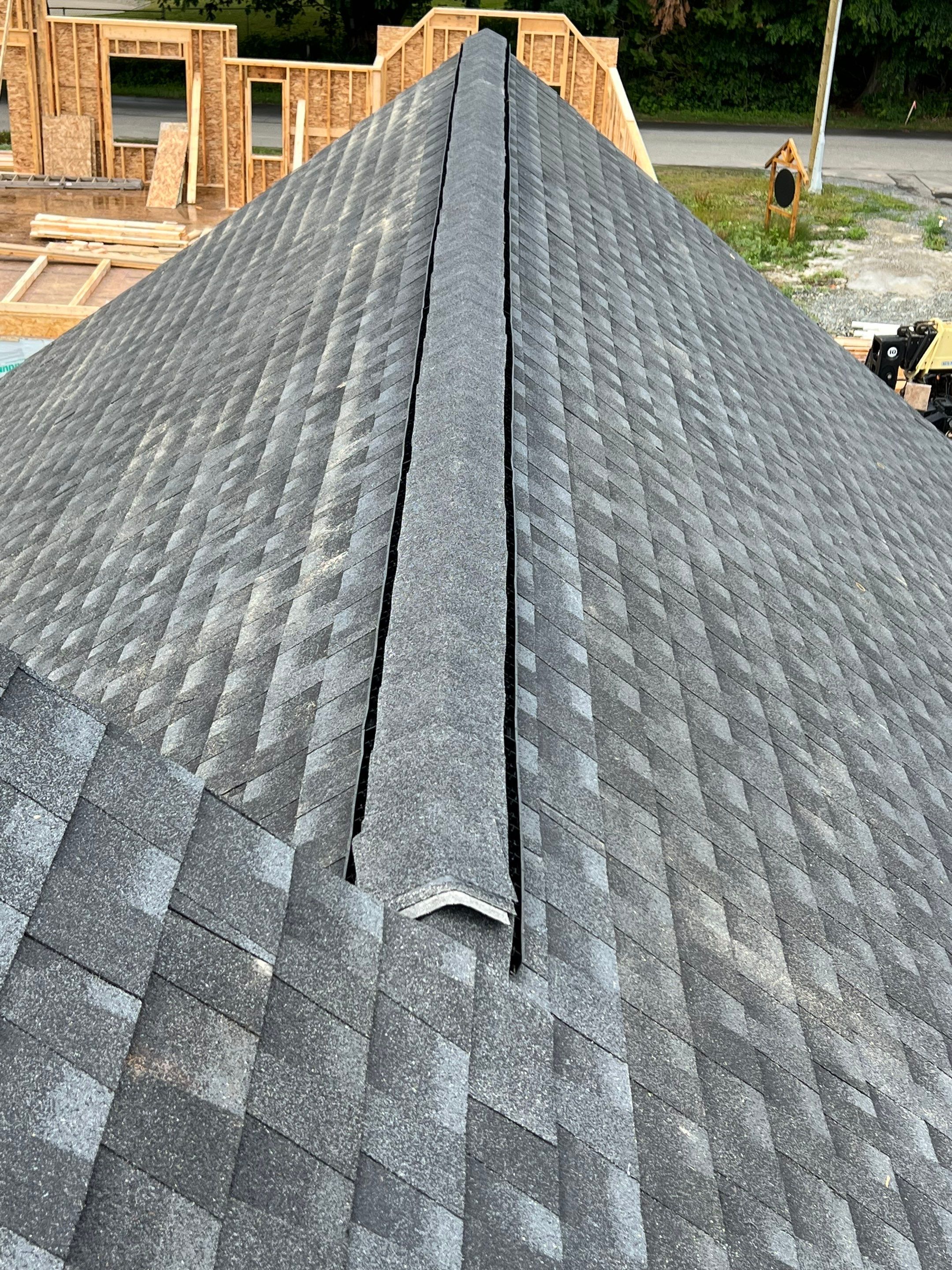 Residential Roofing Installation using GAF Charcoal HDZ by Top Notch Roofing Inc