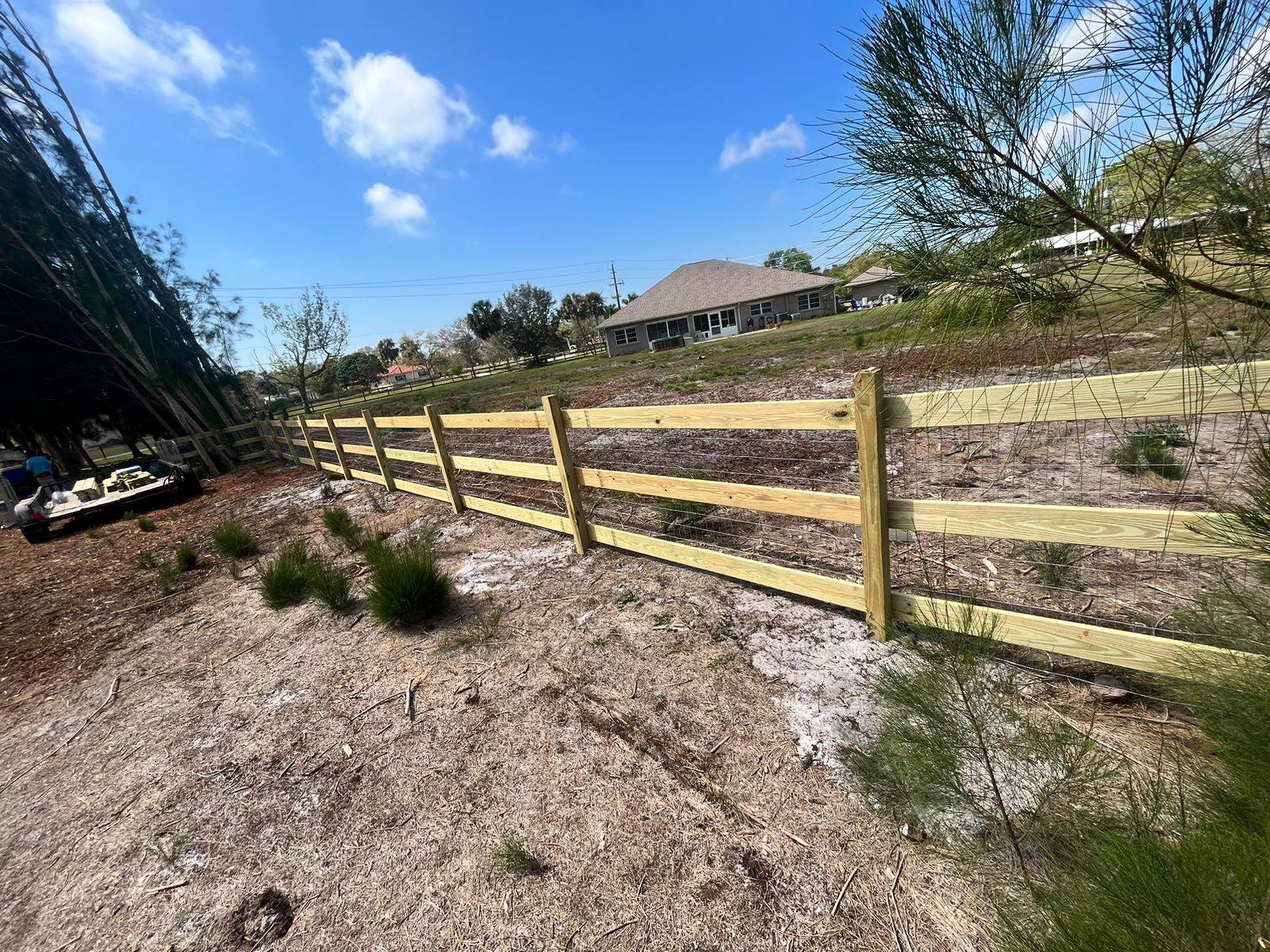 Custom Wood Farm Fence with Welded Wire Mesh in Nokomis by True Fence LLC