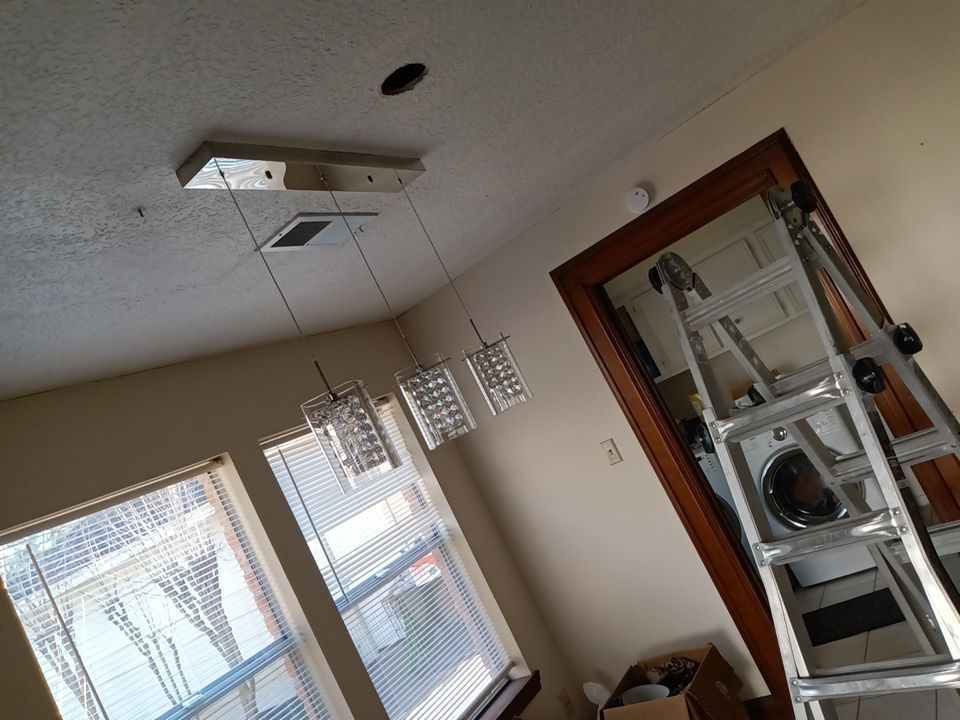 Interior and exterior painting project by Roof Concepts Construction
