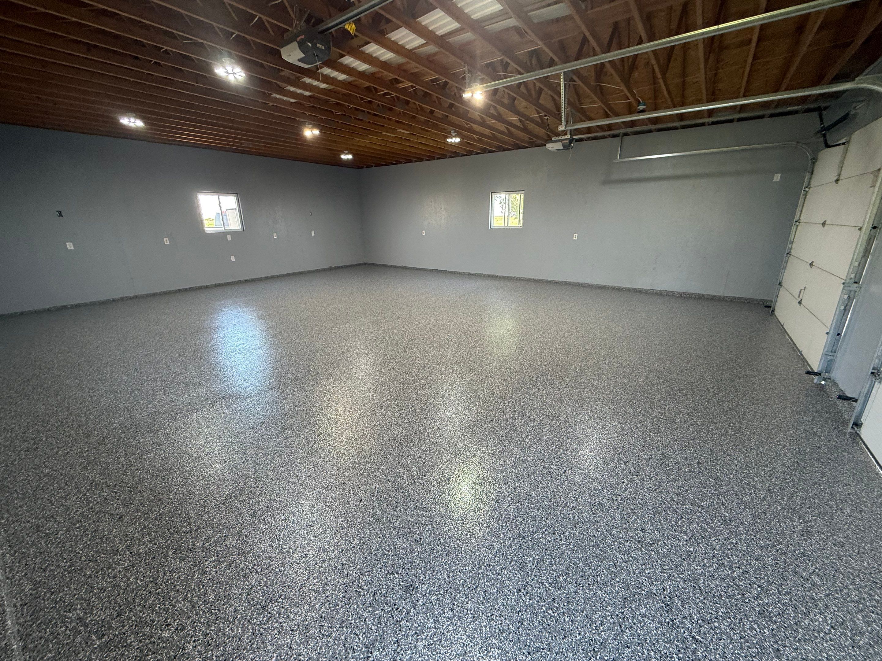 Four-Stall Garage Epoxy Floor Coating in Hampton by Goat Coatings