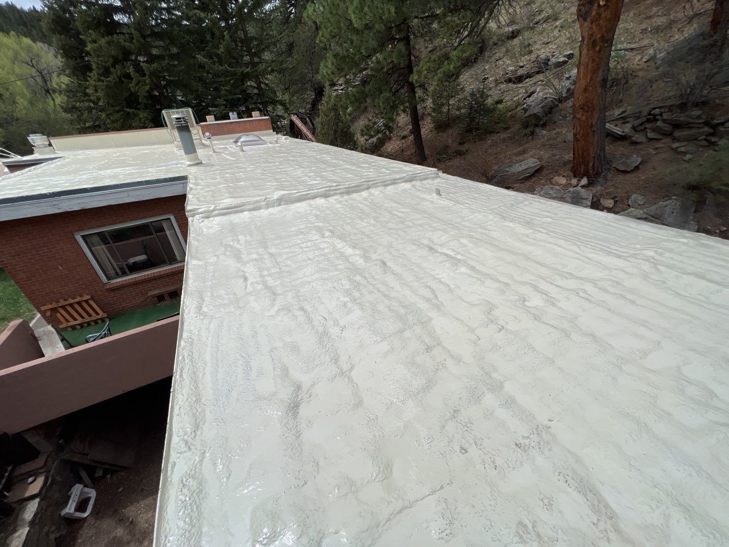 Commercial Roofing Installation using CASTAGRA ECODUR COATING by A to Z Roofing