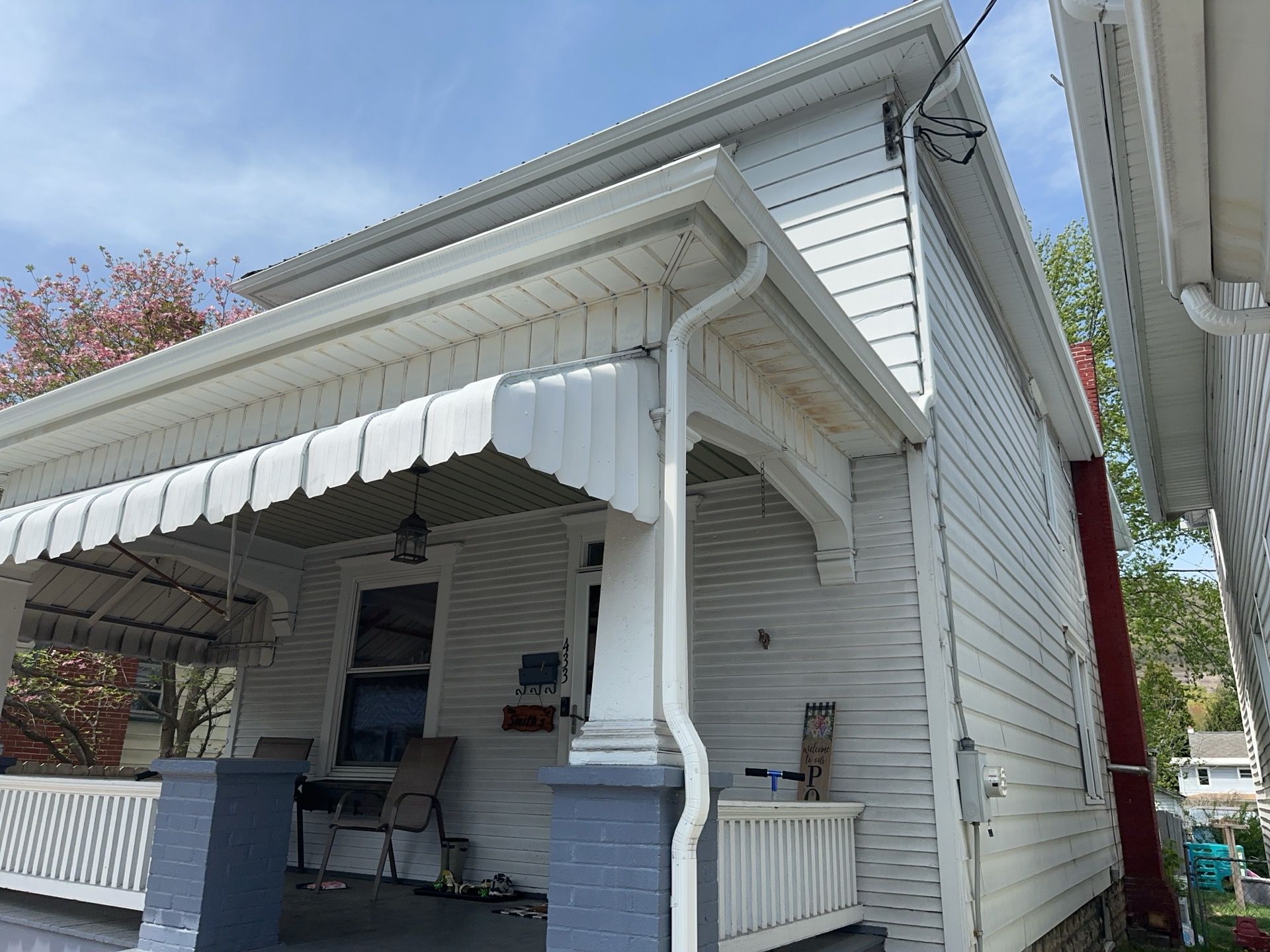Charcoal Metal Roof & Blue Siding — A Refreshing New Look by Esh Builders