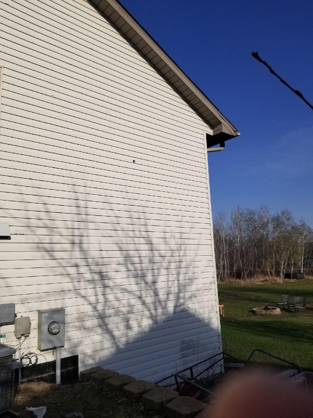 Siding Installation using LP SmartSide and Pella Vinyl Windows by MODERN EXTERIOR SYSTEMS