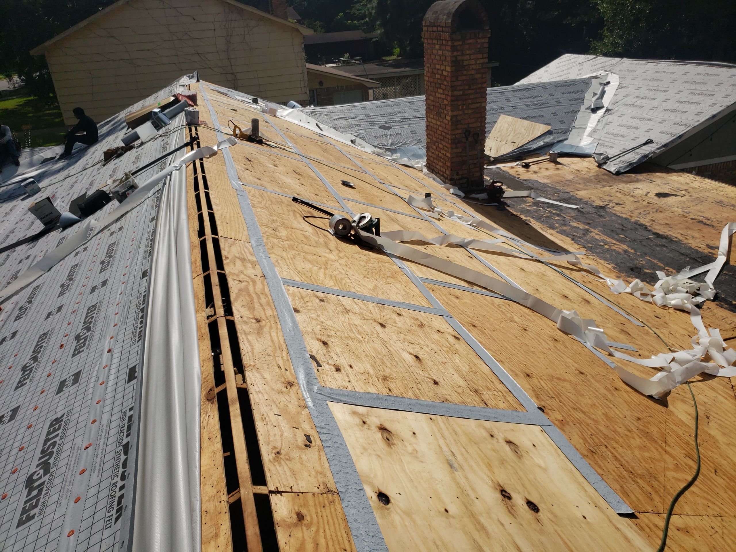 Residential Roofing Installation using Roof Replacement by American Roofing & Construction LLC