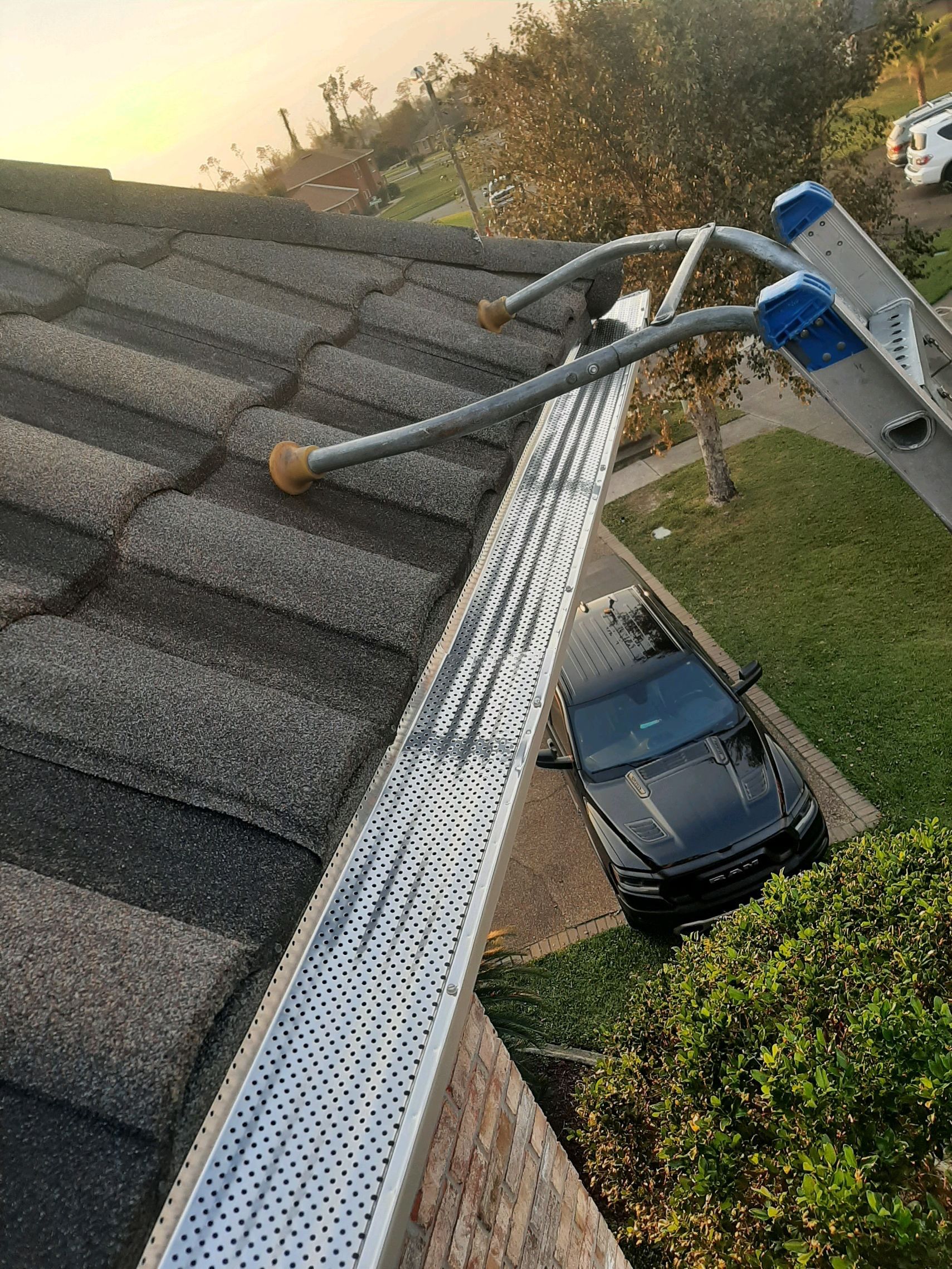 Seamless Gutter Installation with Wicker Color K-Style Gutters and LeafBlaster Pro Mesh Gutter Guards by Gutter Professors