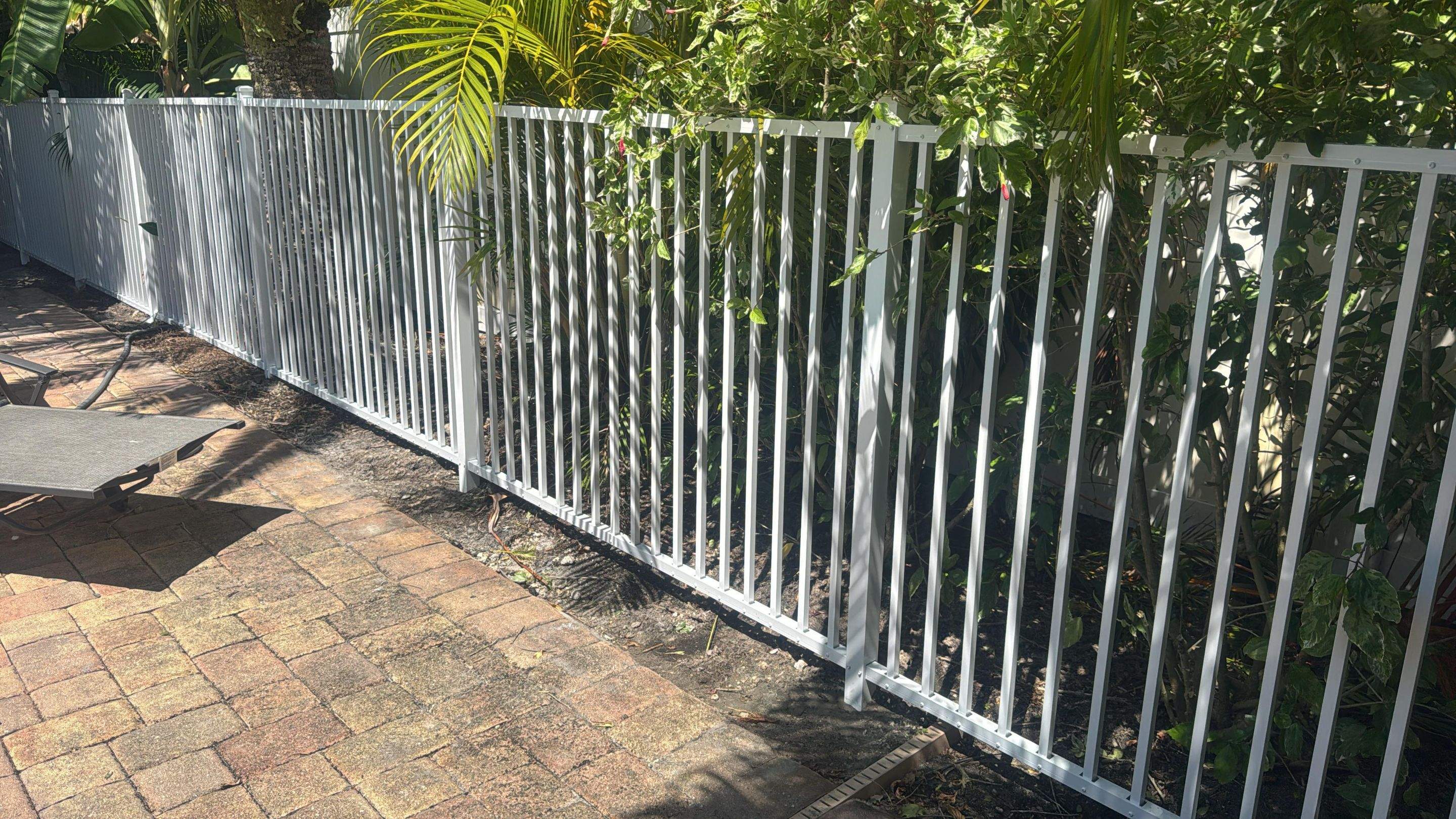 Commercial White Aluminum Pool Fence Installation in Naples by True Fence LLC