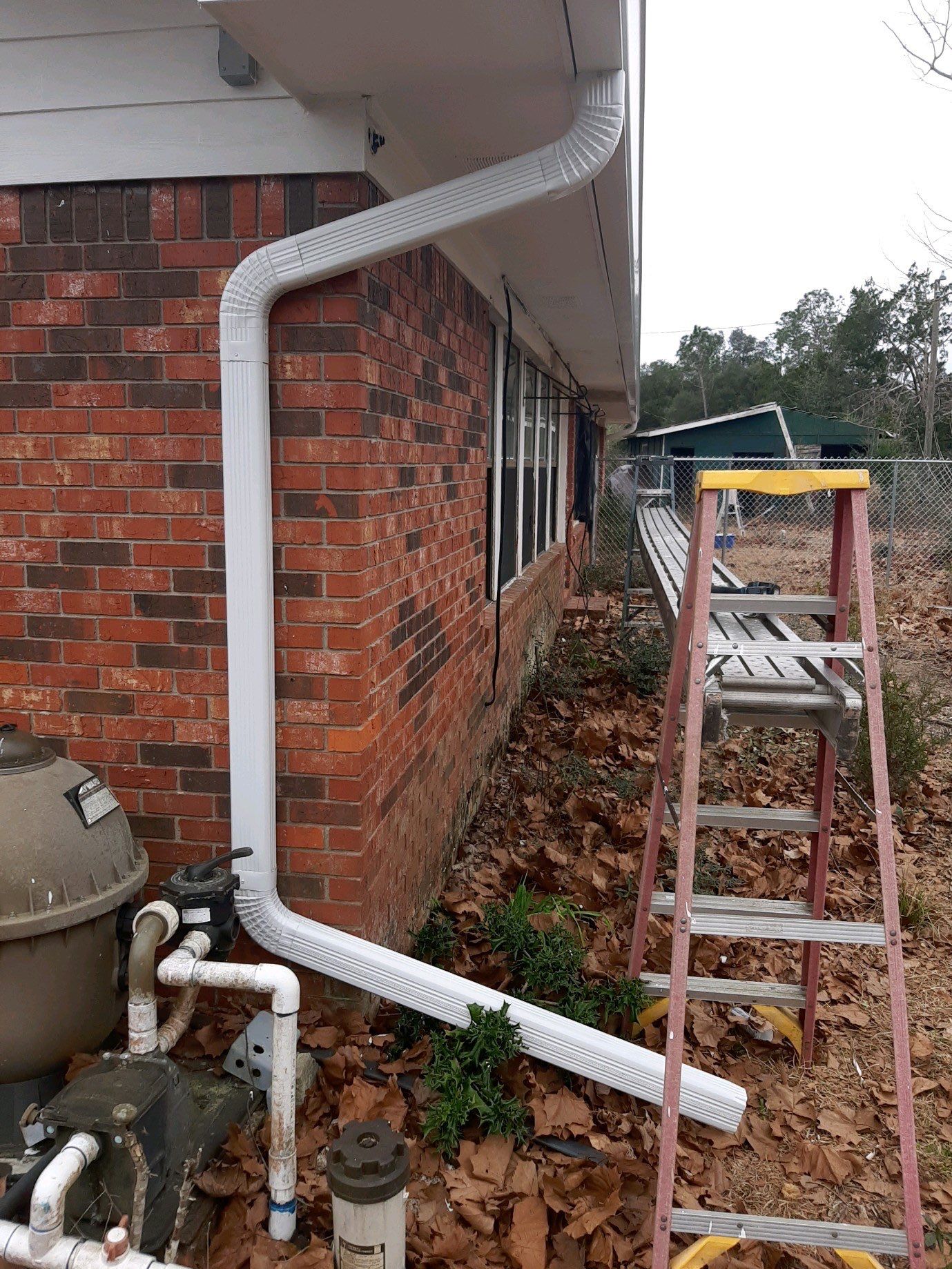 Gutter Installation using White Seamless Gutters by Gutter Professors