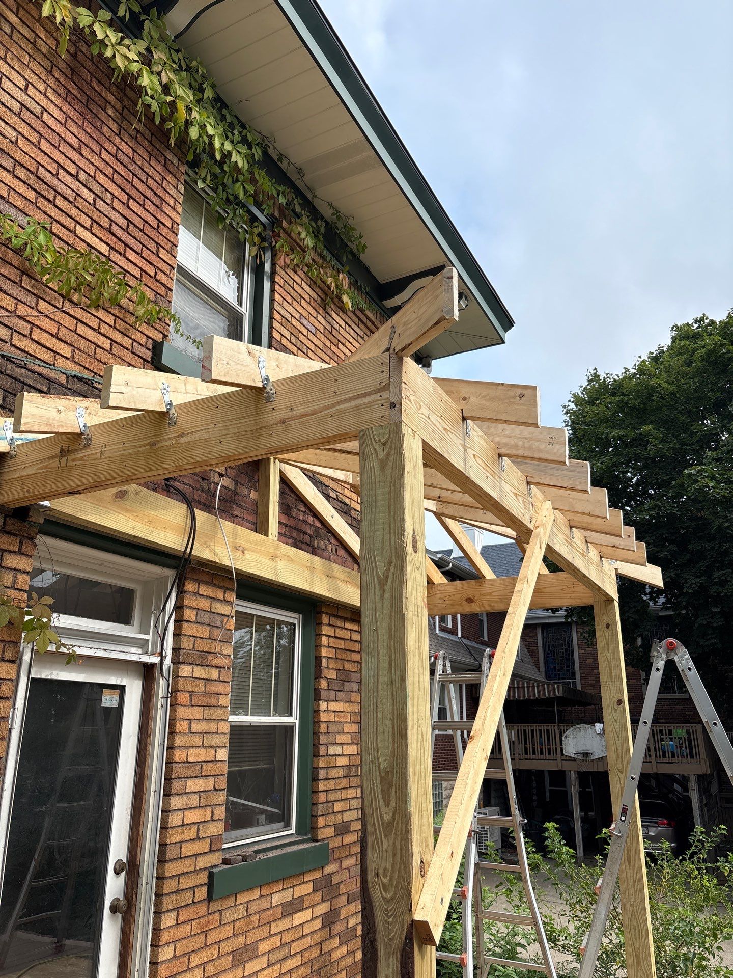 Deck and Roof build  by Cousins Roofing Siding & Decks