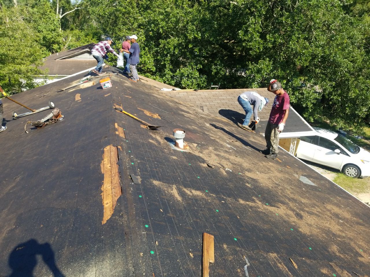 Residential Roofing Installation using Metal roofing by American Roofing & Construction LLC