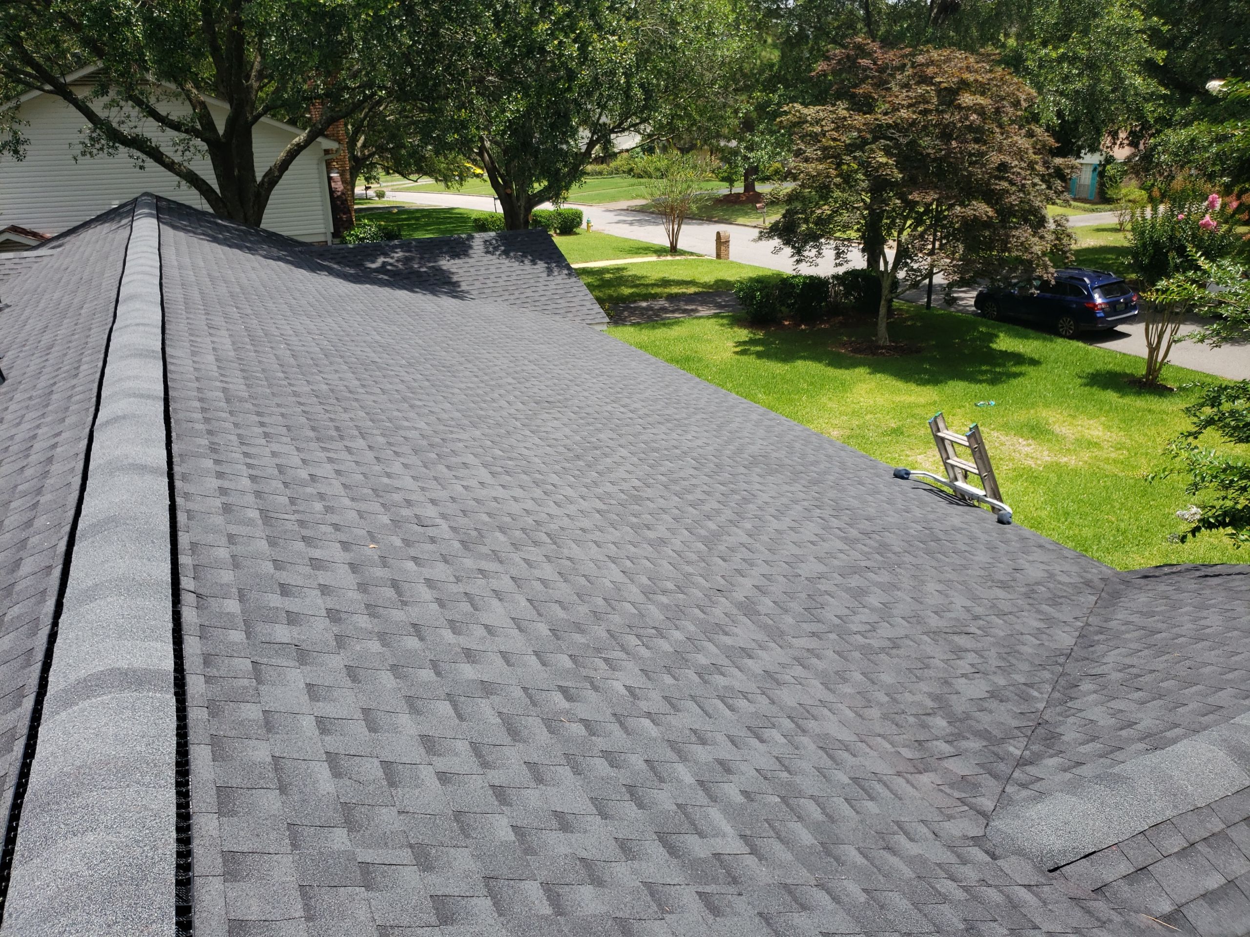 Residential Roofing Installation using Roof Replacement by American Roofing & Construction LLC
