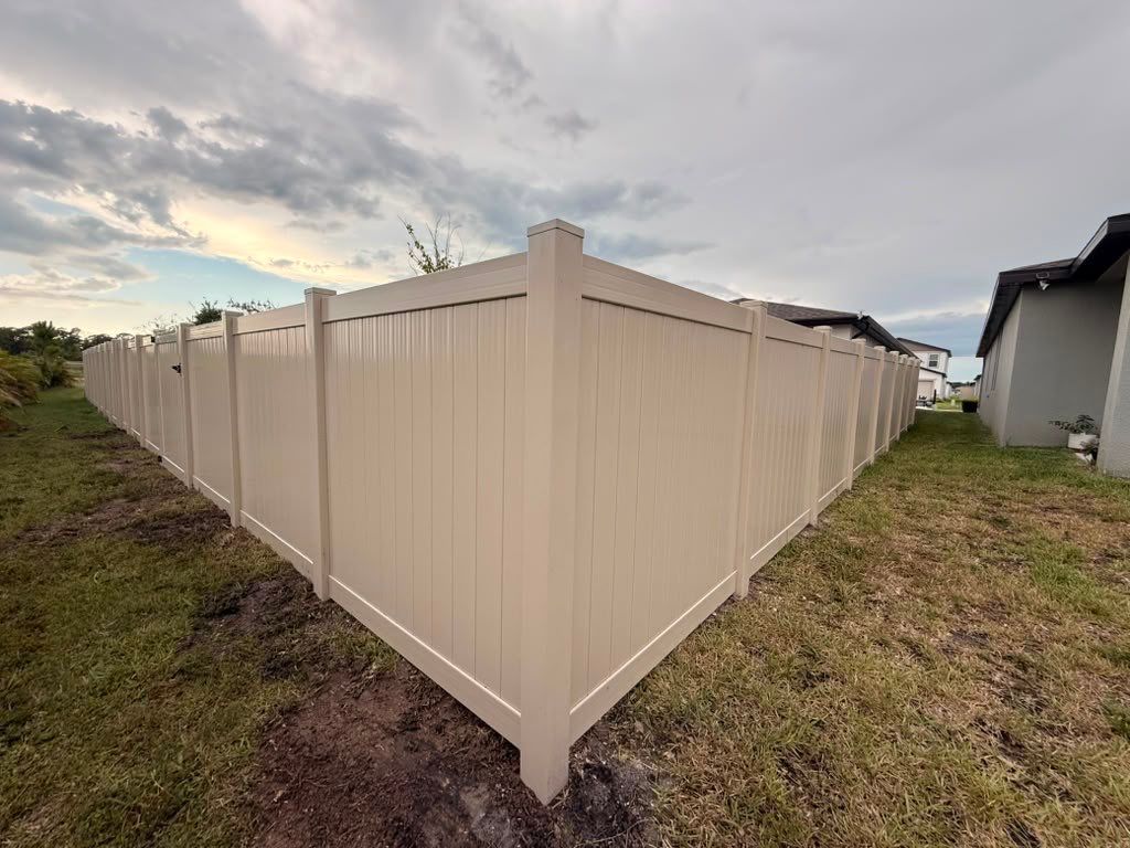 Tan Vinyl Privacy Fence Installation for Sarasota Home by True Fence LLC