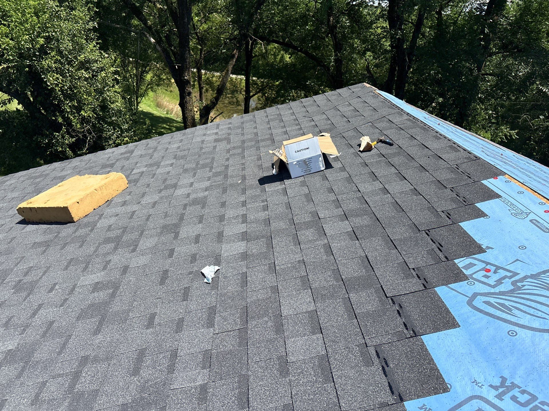 Residential Roof + Gutters & Downspouts Install  by Titan Commercial & Residential Roofing 