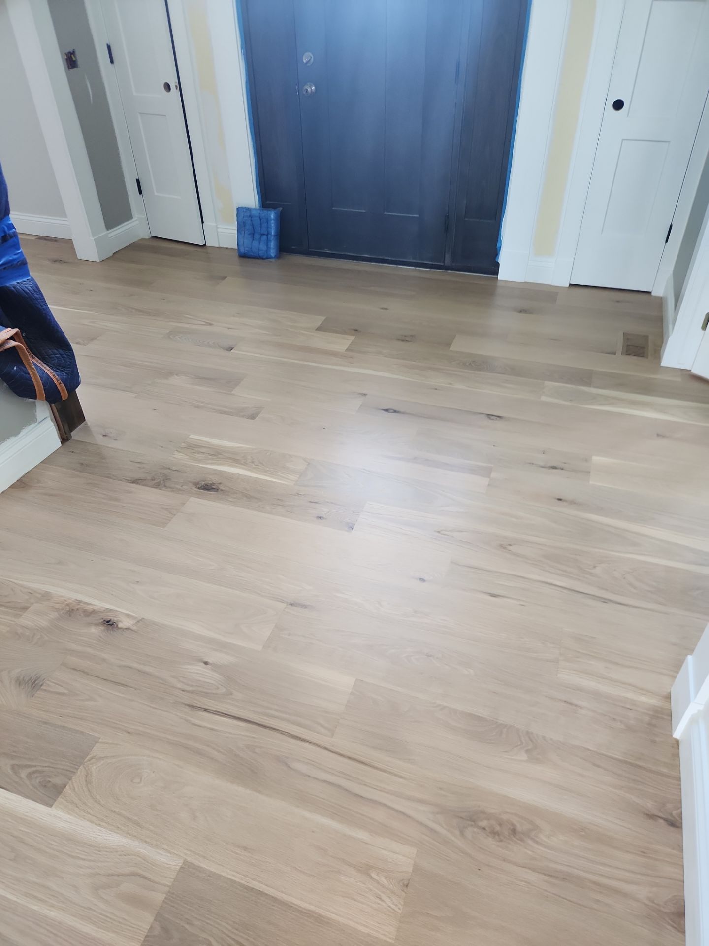  7 inch wide engineered  White Oak site sand and finish by Ann Arbor Hardwoods 