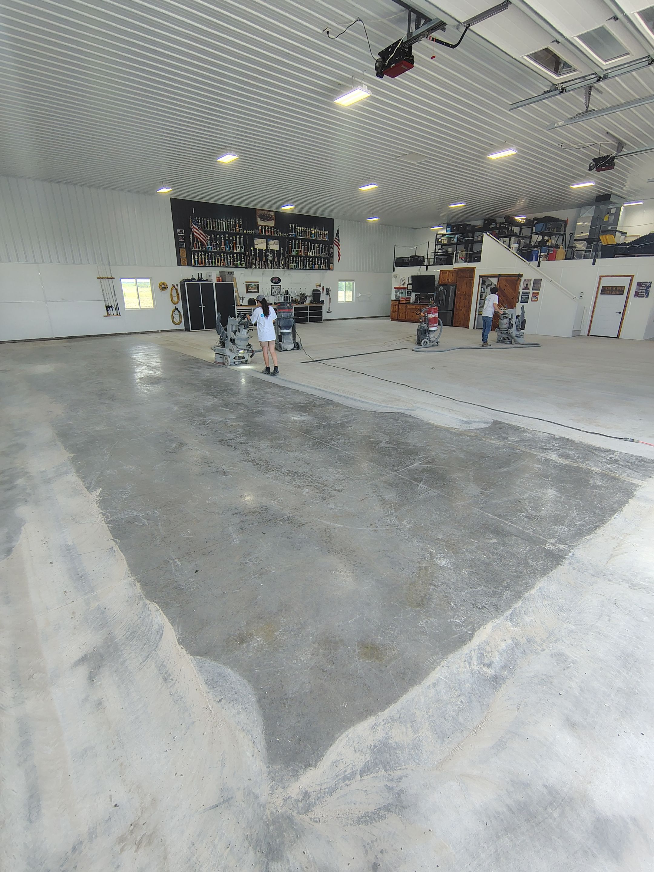 Multi-Stage Concrete Floor Coating for Egan Shop and RV Storage by Select Painting, Coatings & Garage Cabinets
