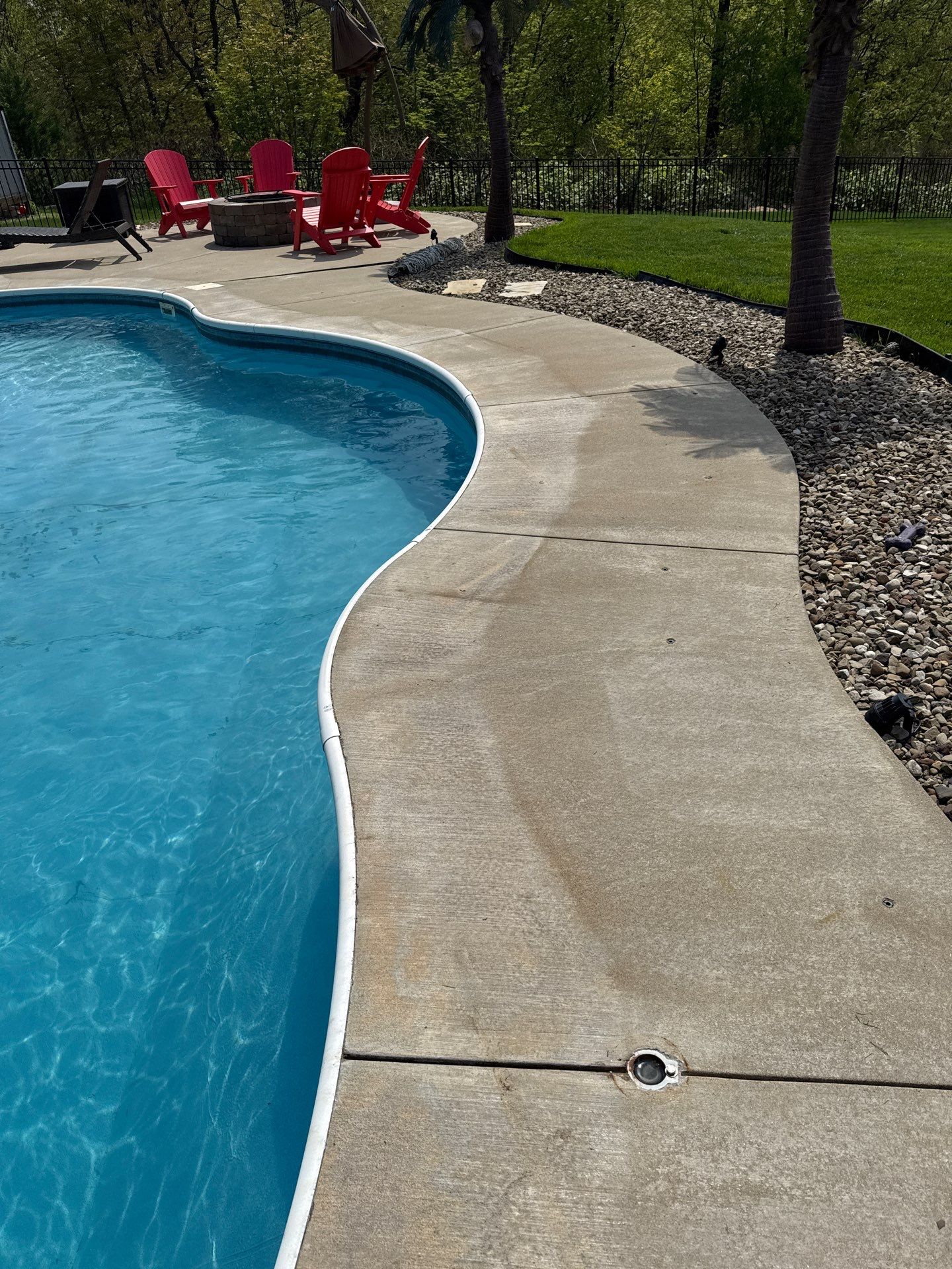 Twilight Pool Deck / Patio Project in Beaver falls by Floors in a Day, Inc