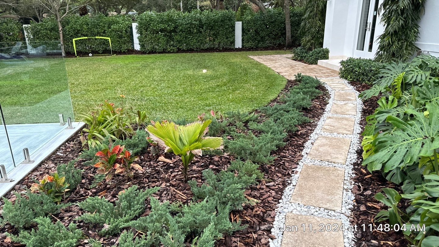 Backyard Landscape Renovation by Nature's Dream Landscape and Tree Service