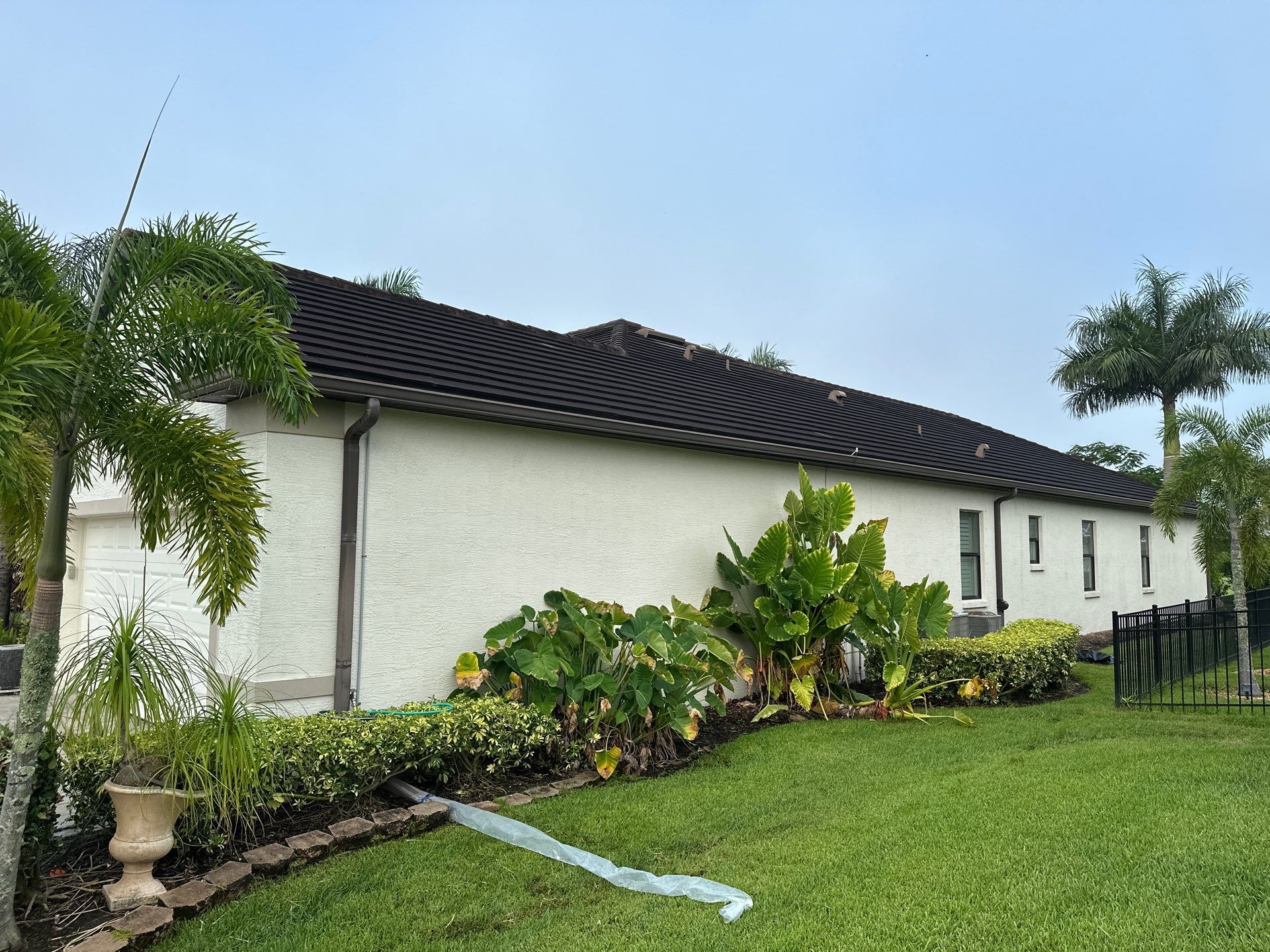 Flat Tile Roof Cleaning, House Wash & Sidewalk Cleaning in Enclave at Country Meadows, Bradenton, FL | Sunshine AquaWash by Sunshine AquaWash