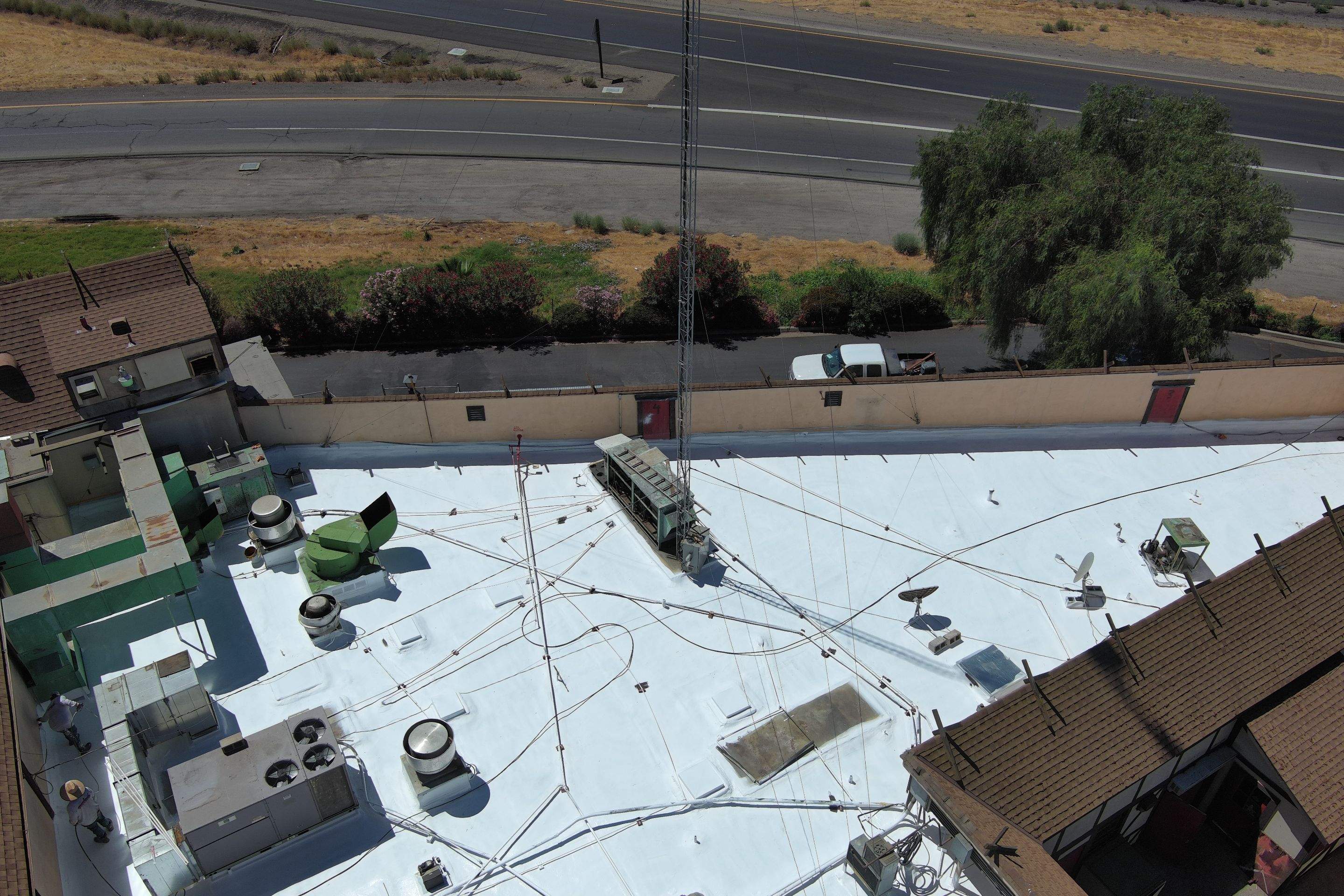 Spray foam and coatings using General Coatings acrylic coatings and spray foam by Straight Edge Roofing Inc