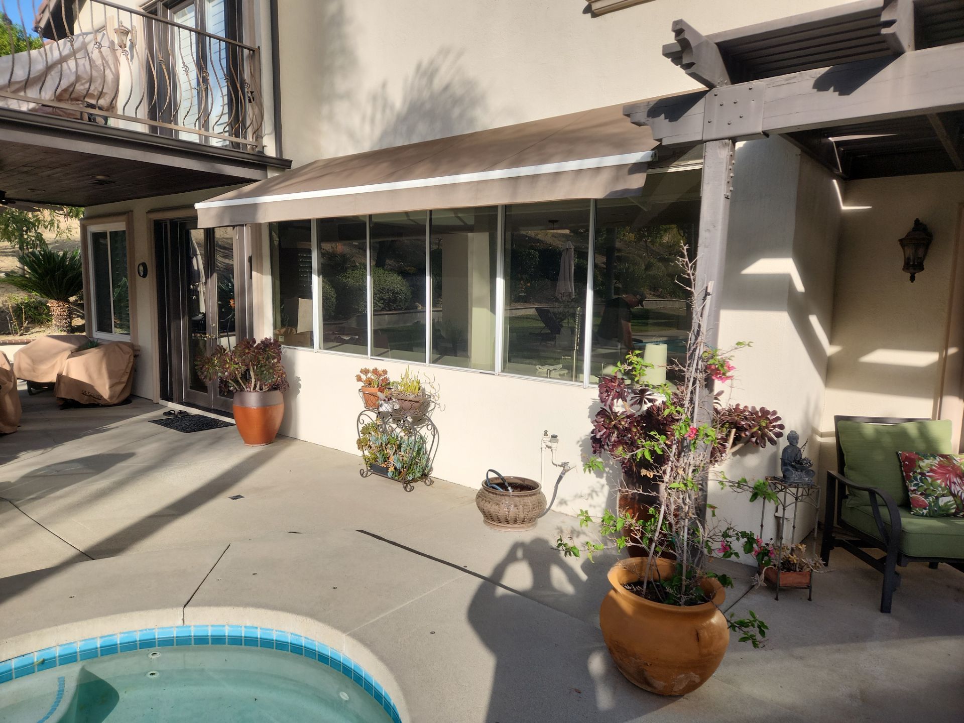 Window Installation using Anlin vinyl windows with Sunshield glass by American Window Company